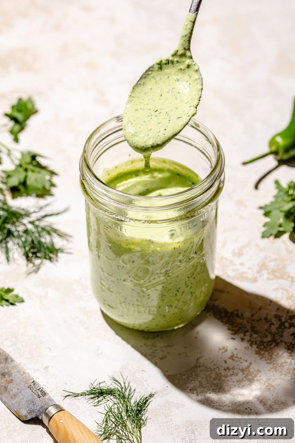 Jalapeño ranch for Monterey Melt Smash Burgers in glass jar.