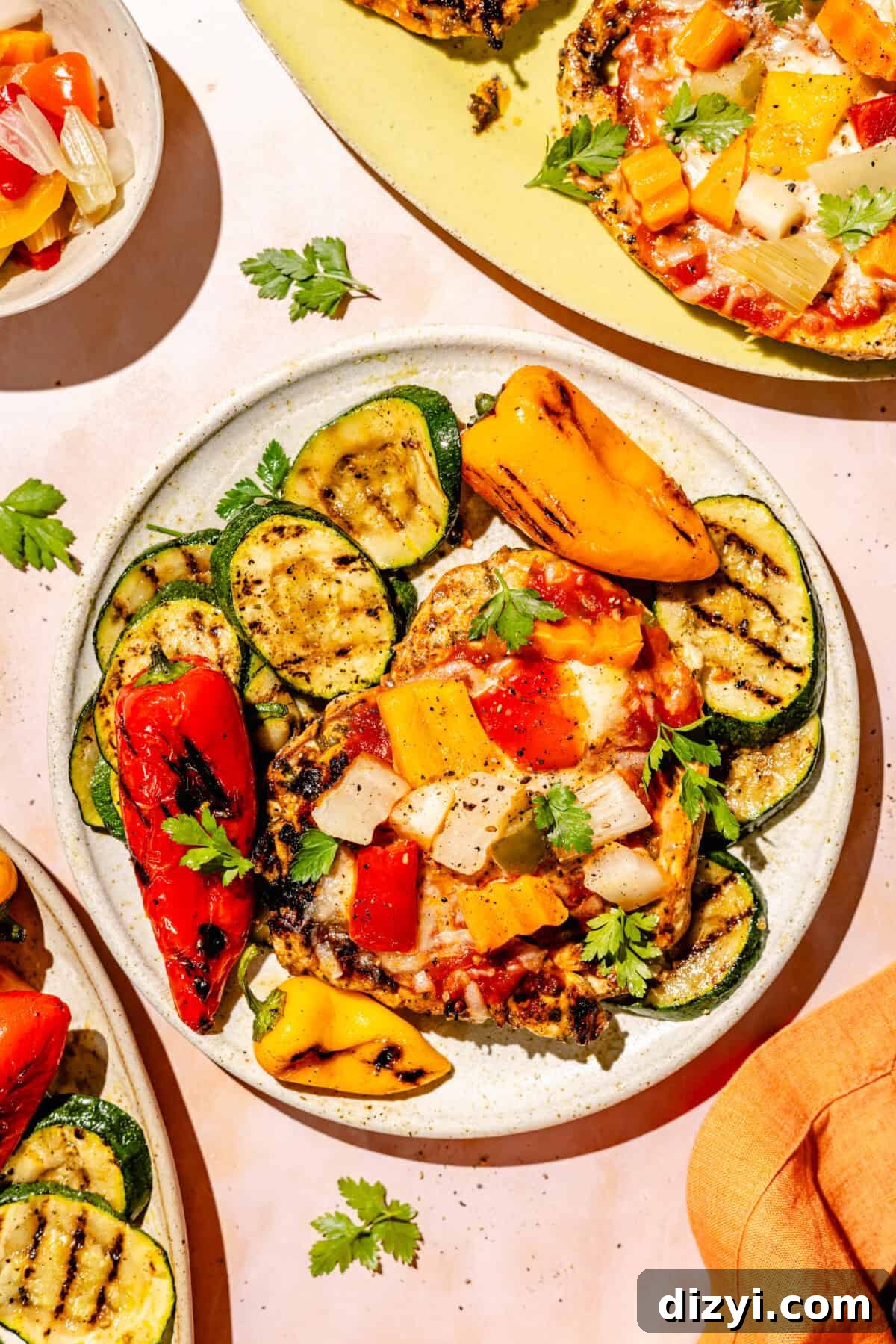 Giardiniera Chicken Melts plated with veggies.