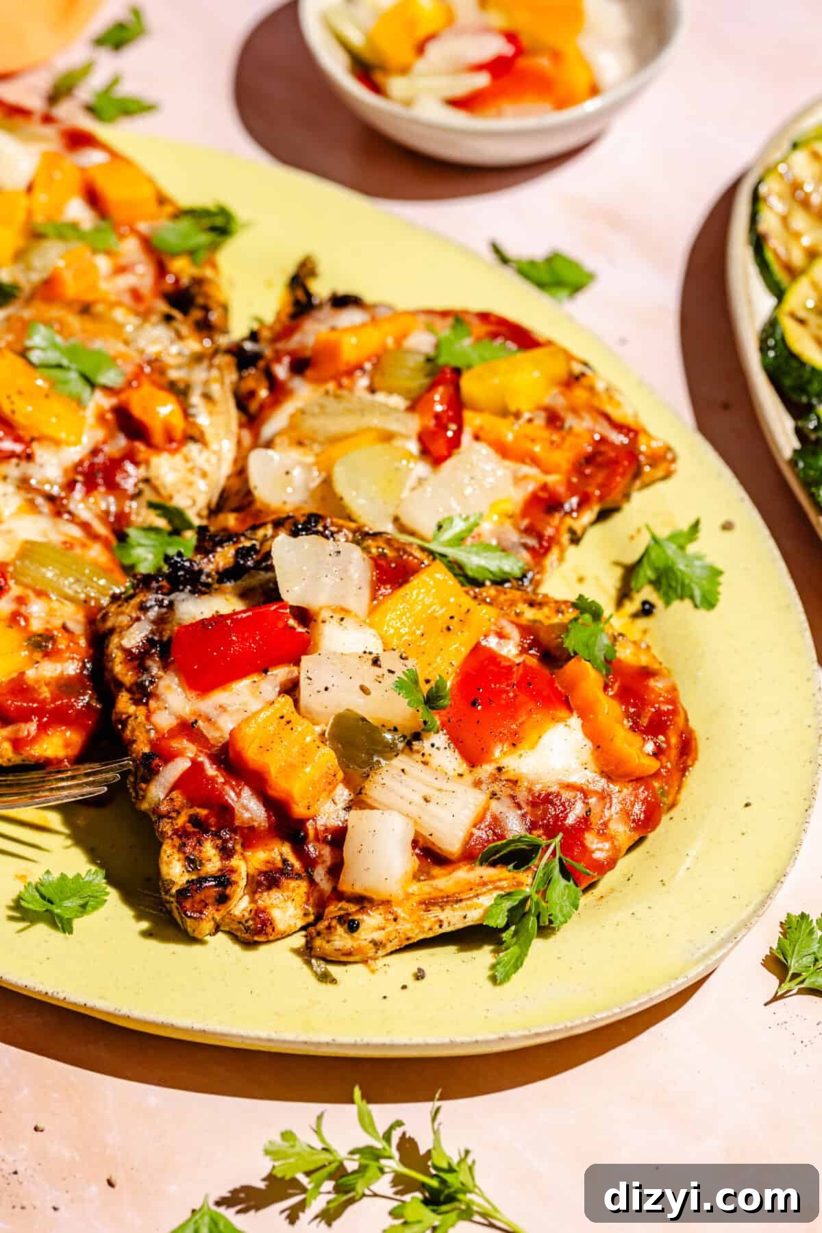 Giardiniera Chicken Melts on large, yellow, oval platter.