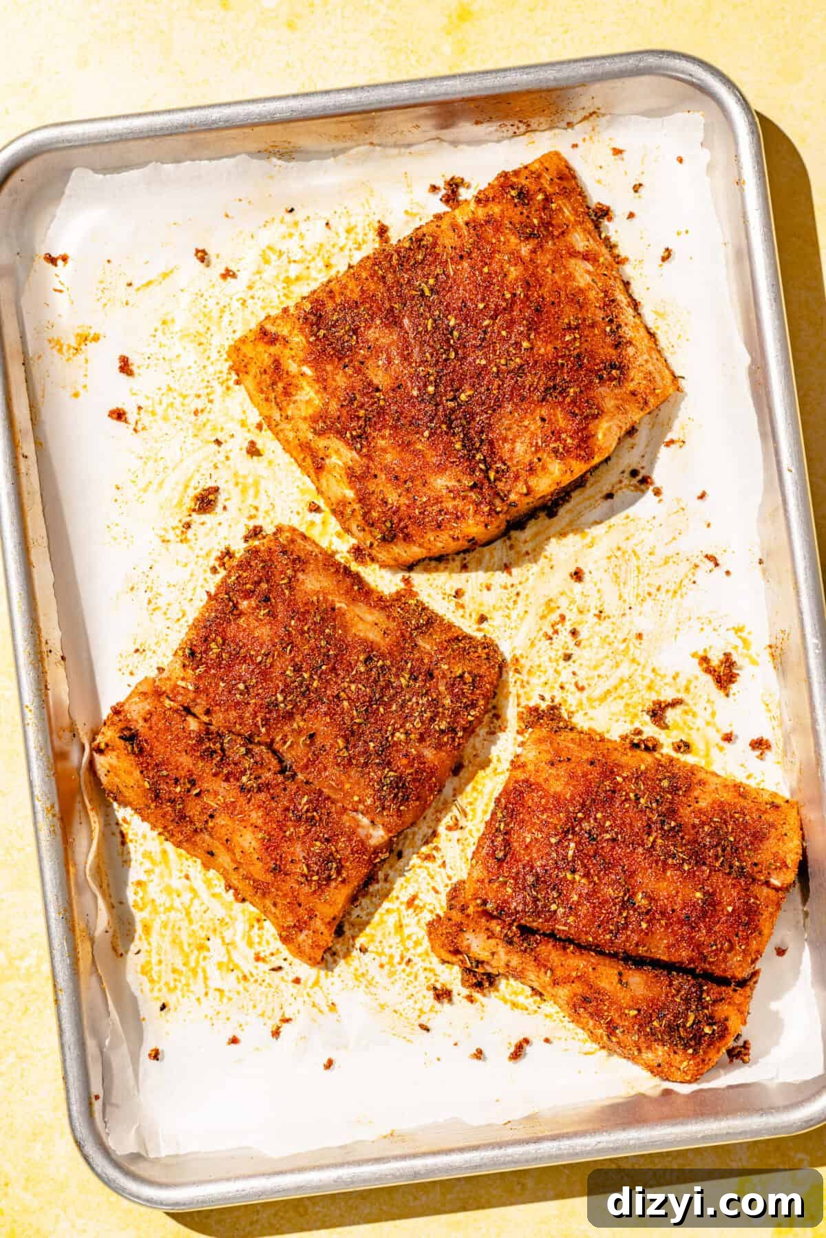 Grilled Fish Tacos with Citrus Slaw and Tangy Green Sauce 3 Salmon filets marinating on sheet pan.
