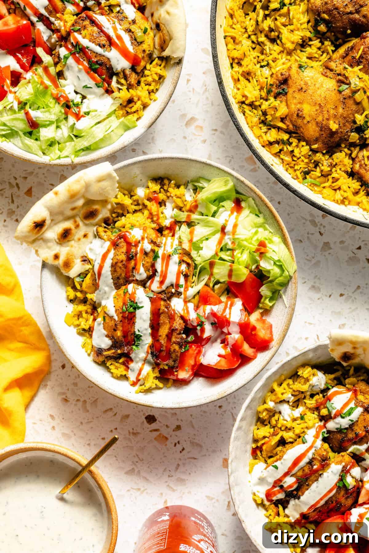 Halal-Inspired Chicken and Rice Skillet served in bowls with toppings.