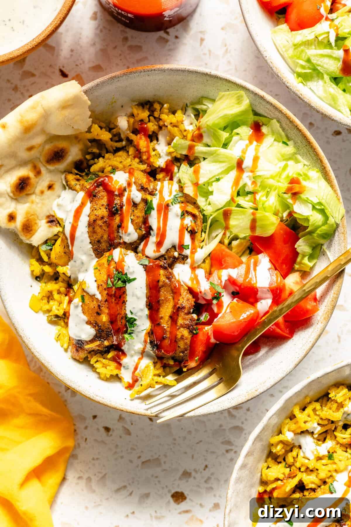 Halal-Inspired Chicken and Rice Skillet served in bowls with toppings.