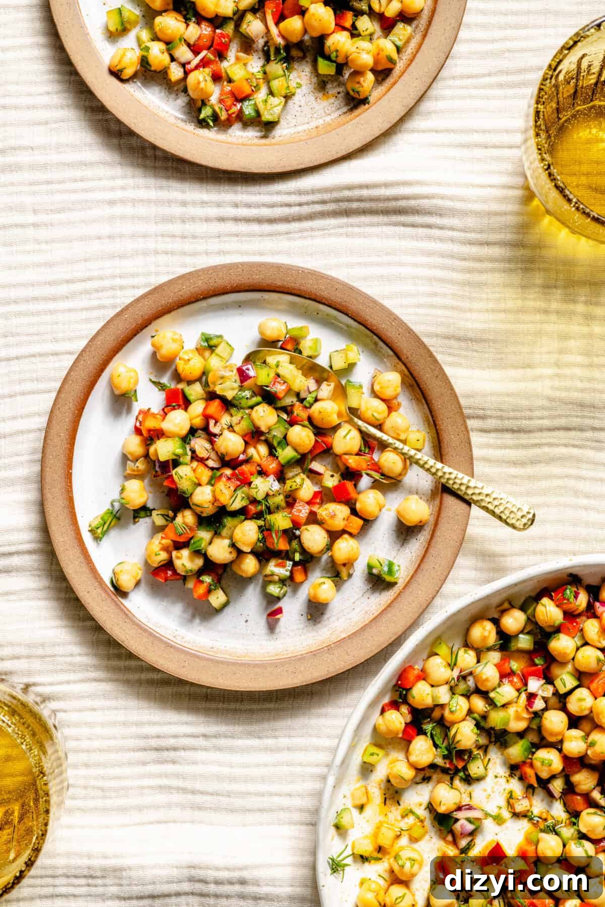 Rainbow Chickpea Salad plated on low bowls.