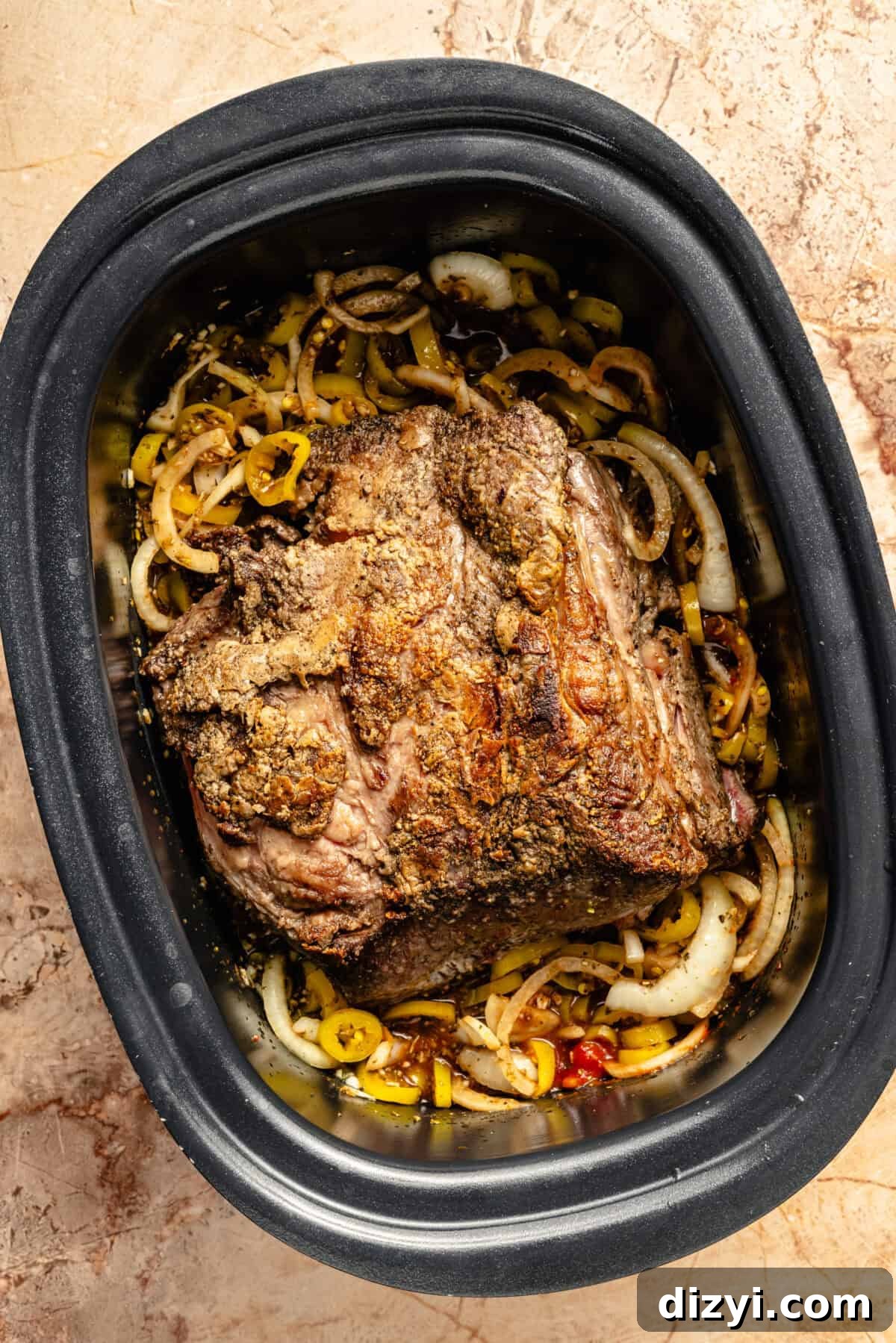 Slow Cooker Italian Shredded Beef Sliders Recipe 6 The browned roast, veggies, and sauce nestled in the slow cooker.