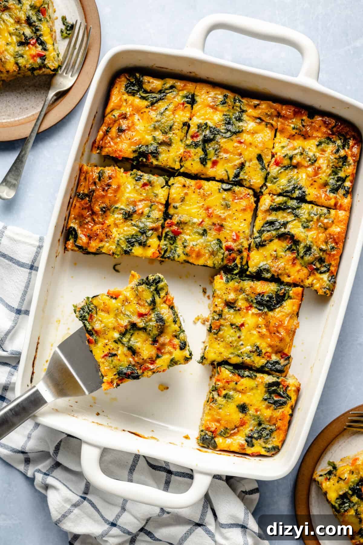 Classic Old Fashioned Breakfast Casserole Recipe 2 The Old Fashioned Breakfast Casserole baked and cut into squares to serve.