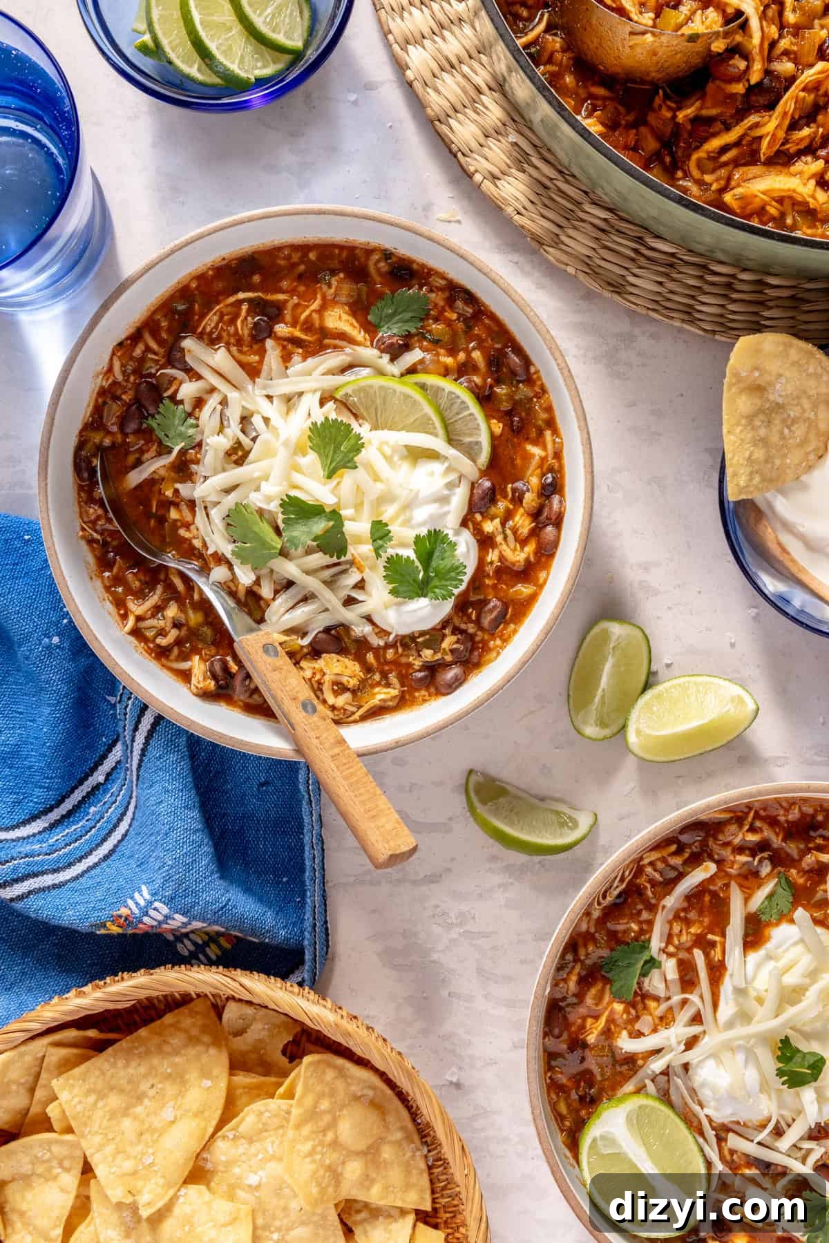 Chicken and Rice Enchilada Soup in bowls.