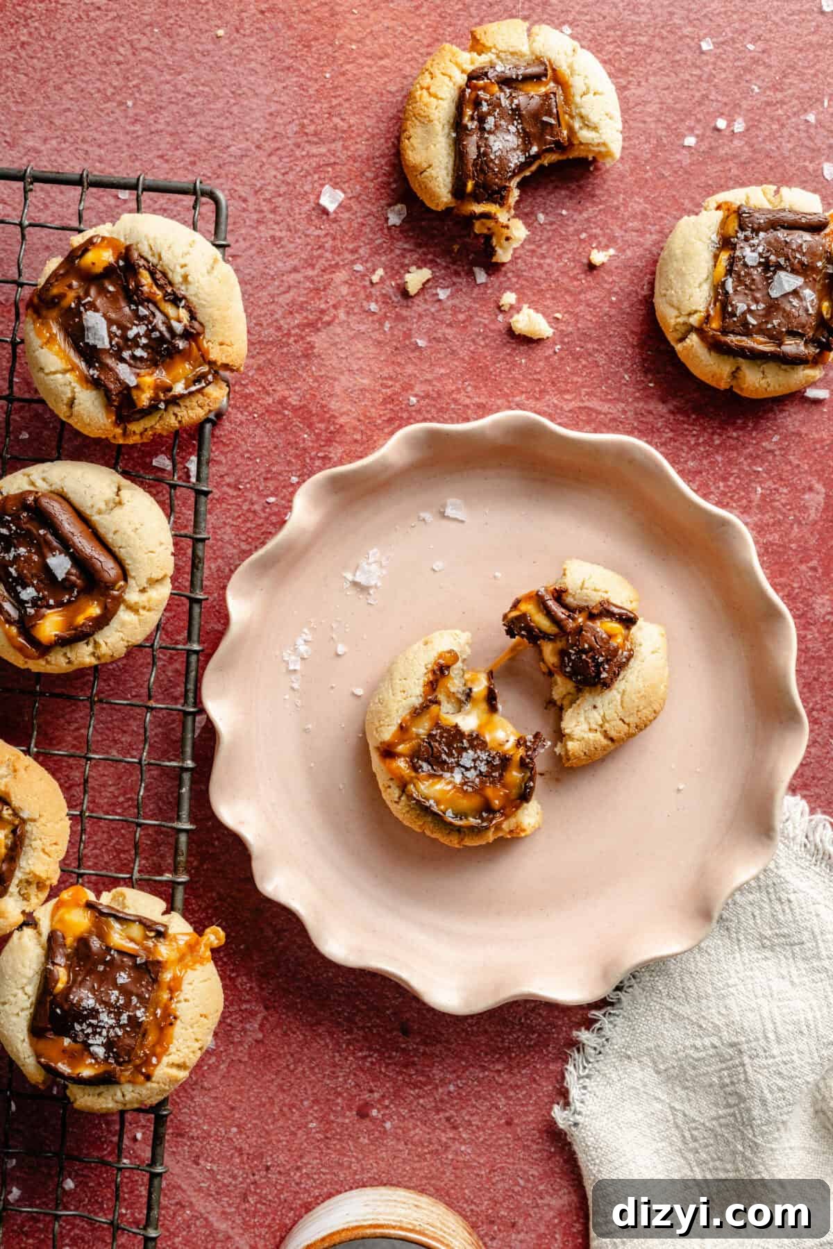 Chocolate Candy Bar Thumbprint Cookies 2 Easy Candy Bar Thumbprint Cookies on plate and wired rack.