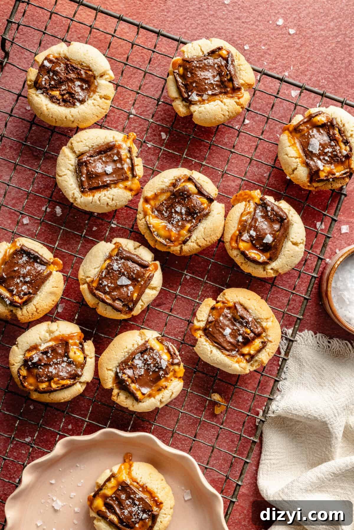 Chocolate Candy Bar Thumbprint Cookies 4 Easy Candy Bar Thumbprint Cookies on wire rack and plate.