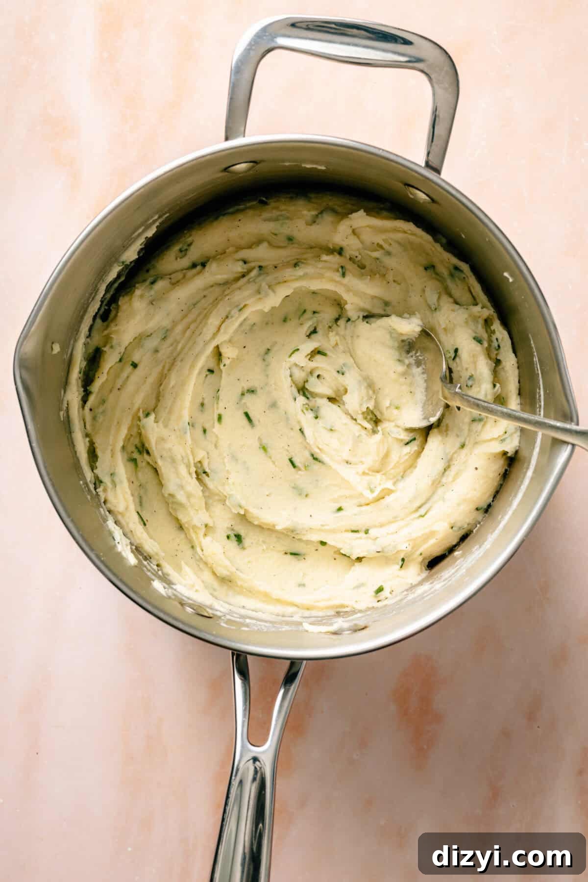 Mashed potatoes in pan.