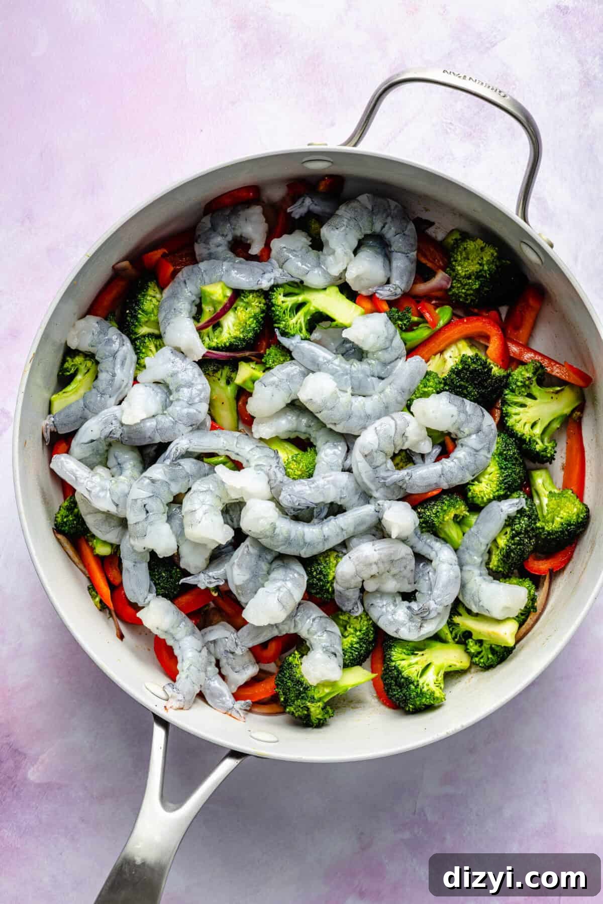 Veggies in saute pan with shrimp
