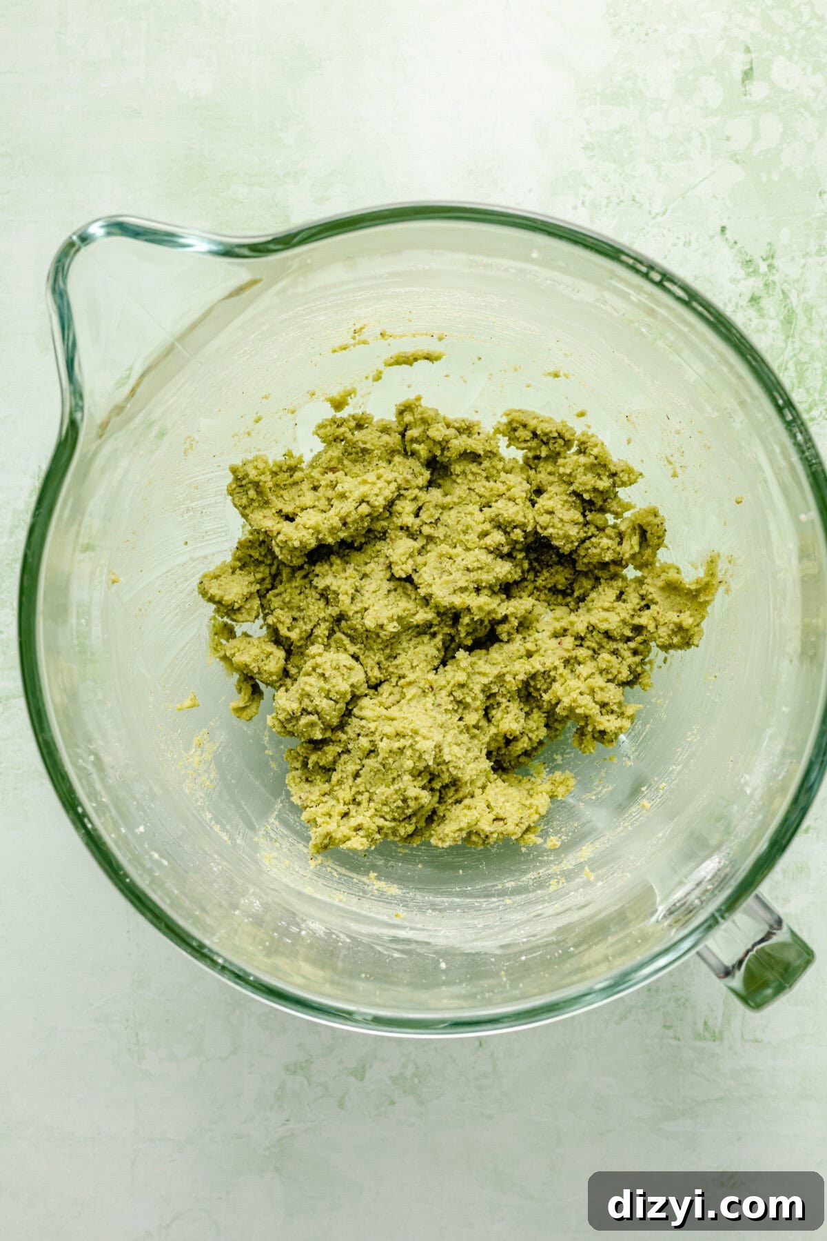 Pistachio Italian Wedding Cookies: Grain-Free Recipe 4 Cookie dough in glass bowl.