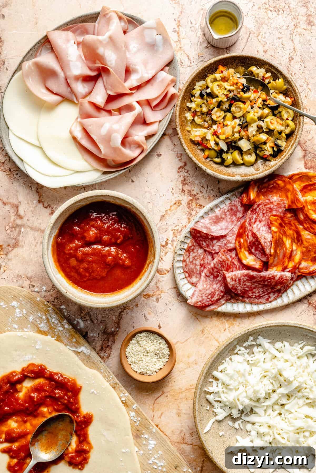 Grilled Muffaletta Pizza Recipe 4 Grilled Muffaletta Pizza ingredients.