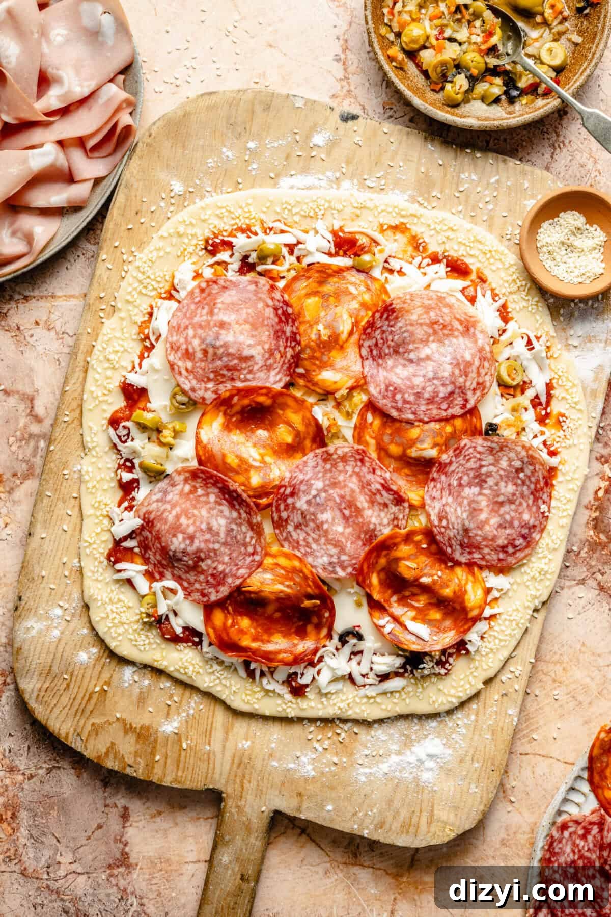 Grilled Muffaletta Pizza Recipe 5 Grilled Muffaletta Pizza before it is baked.