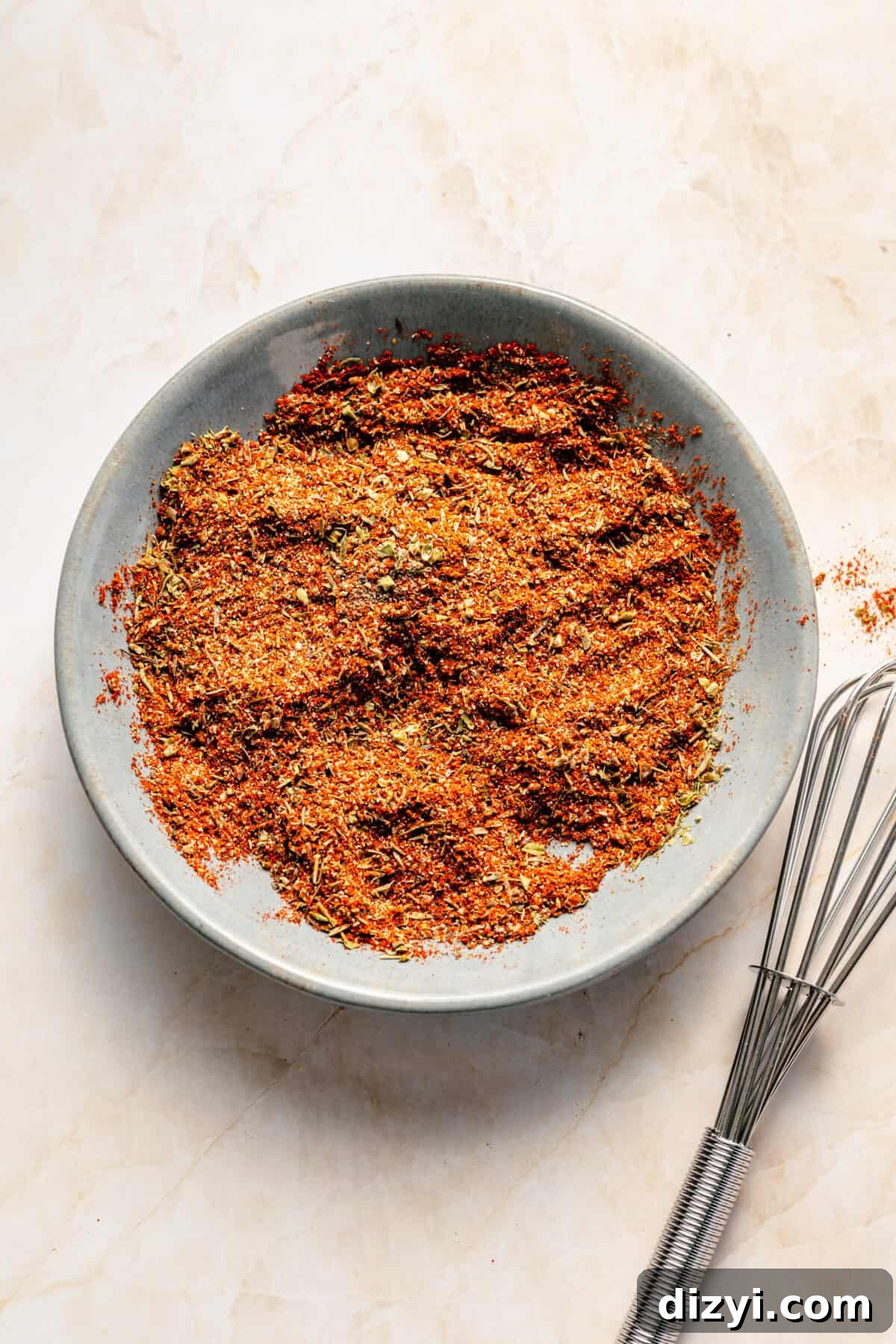 Cajun seasoning mixed in small bowl.