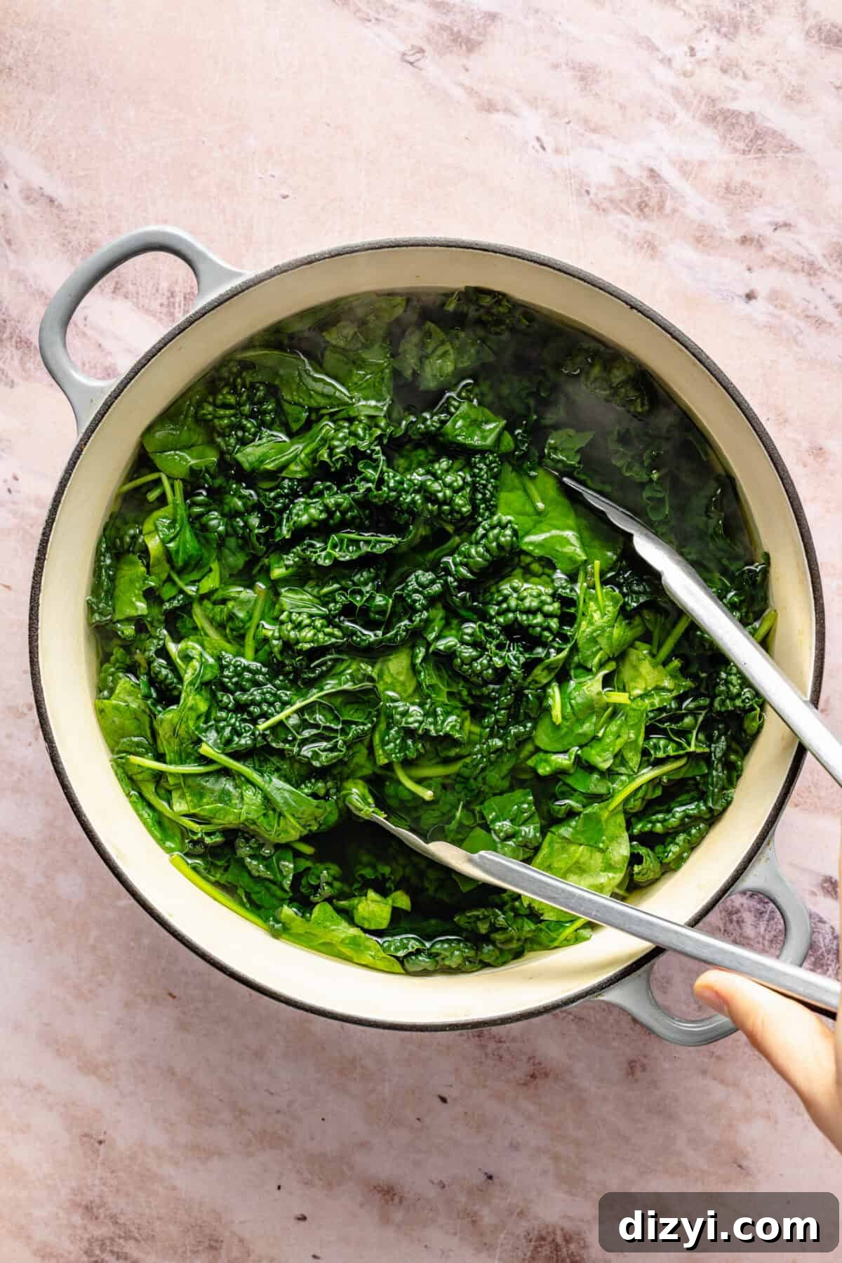 Green Pasta with Spicy Calabrian Breadcrumbs 5 Cooked greens in large pot for Saucy Green Pasta with Calabrian Breadcrumbs.