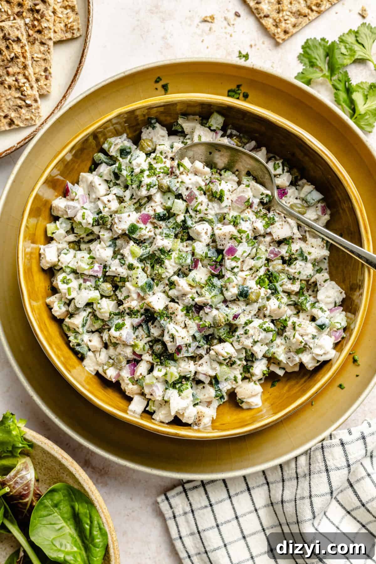 Clayton’s Favorite Chicken Salad in yellow bowl ready to serve.
