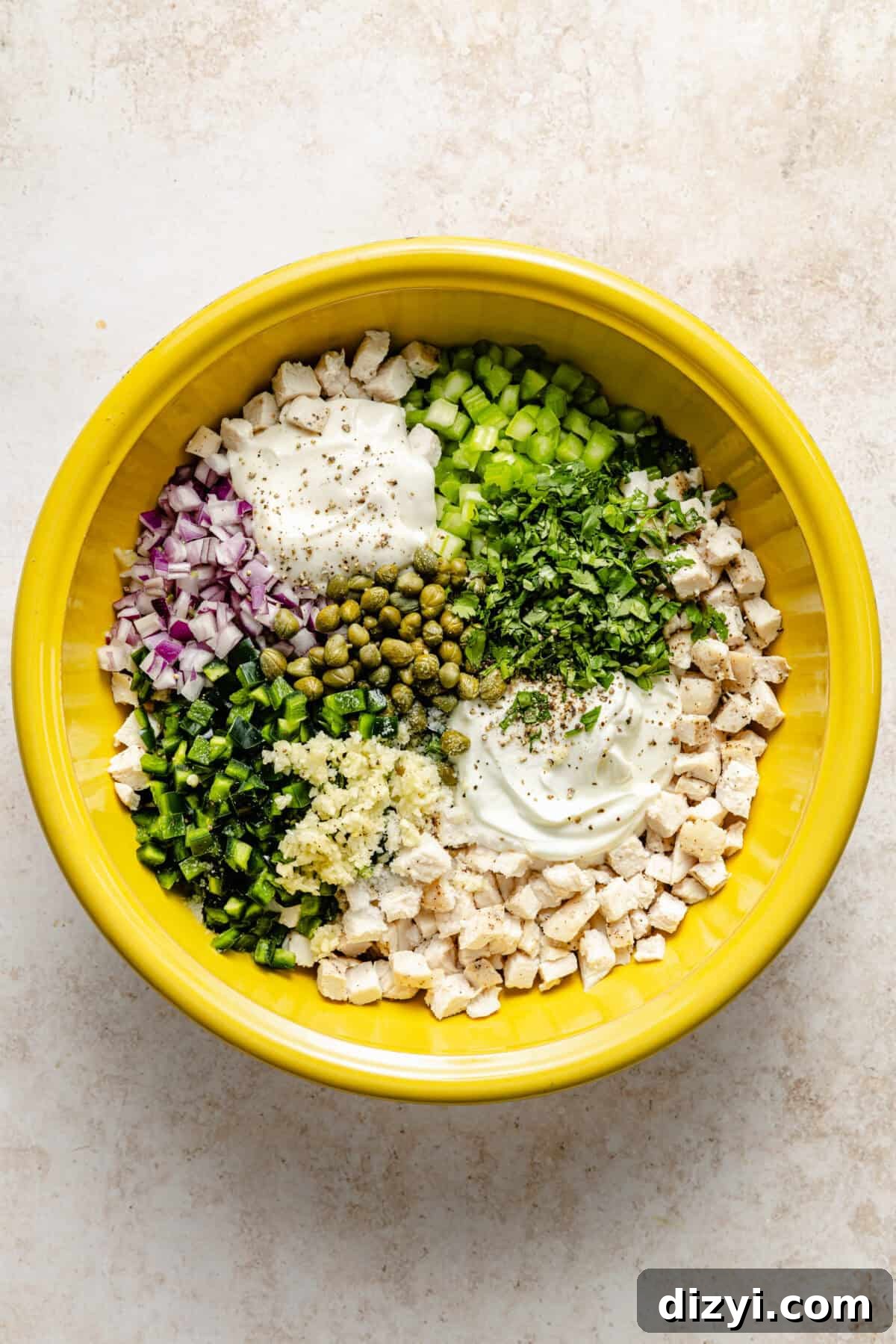 Ingredients for Clayton’s Favorite Chicken Salad in a bowl not mixed.