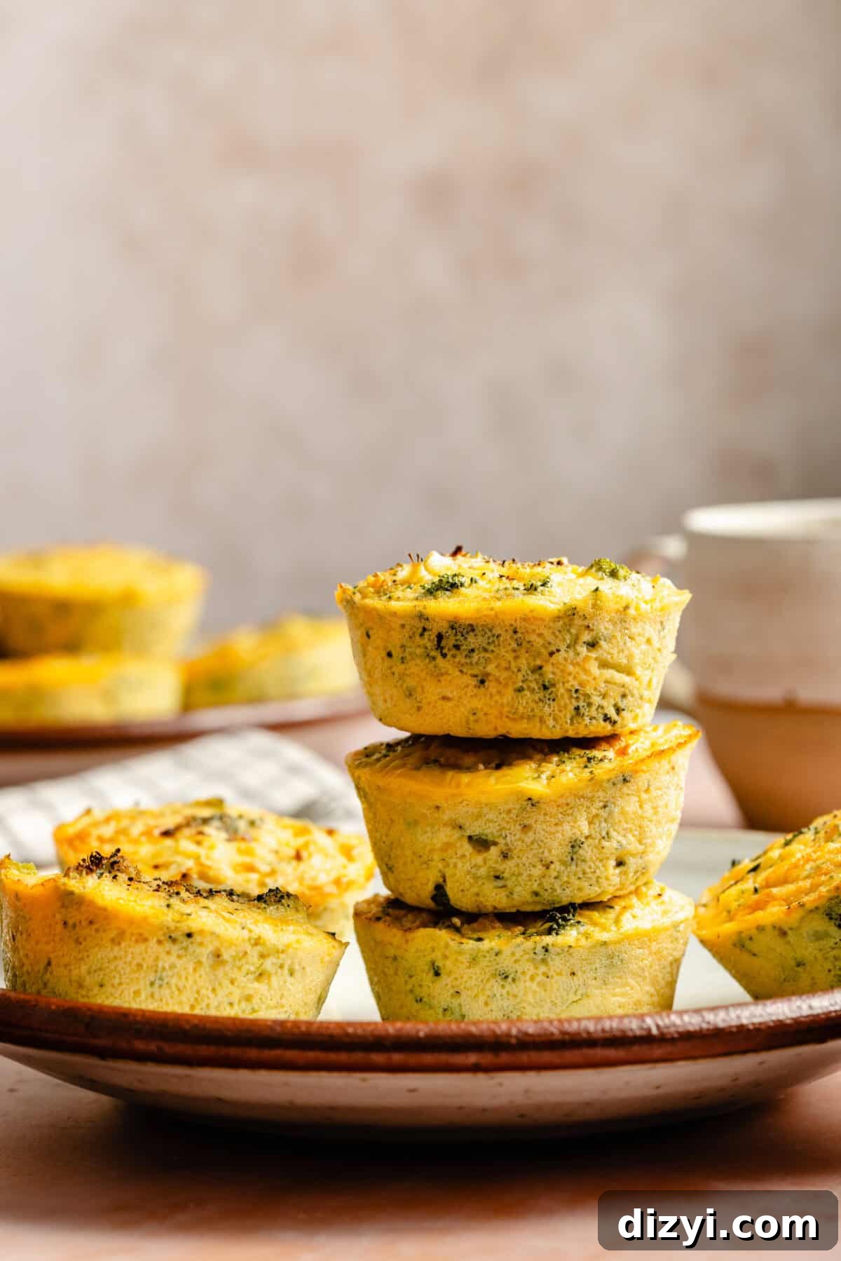 a stack of broccoli and cheddar egg cups on a plate