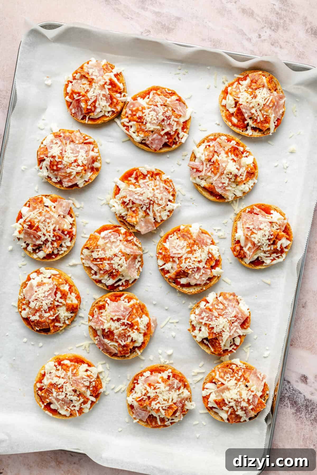 Protein-Packed Gluten-Free Bagel Bites 6 pizza bagels with unbaked toppings like sauce, shredded mozzarella cheese, and salami