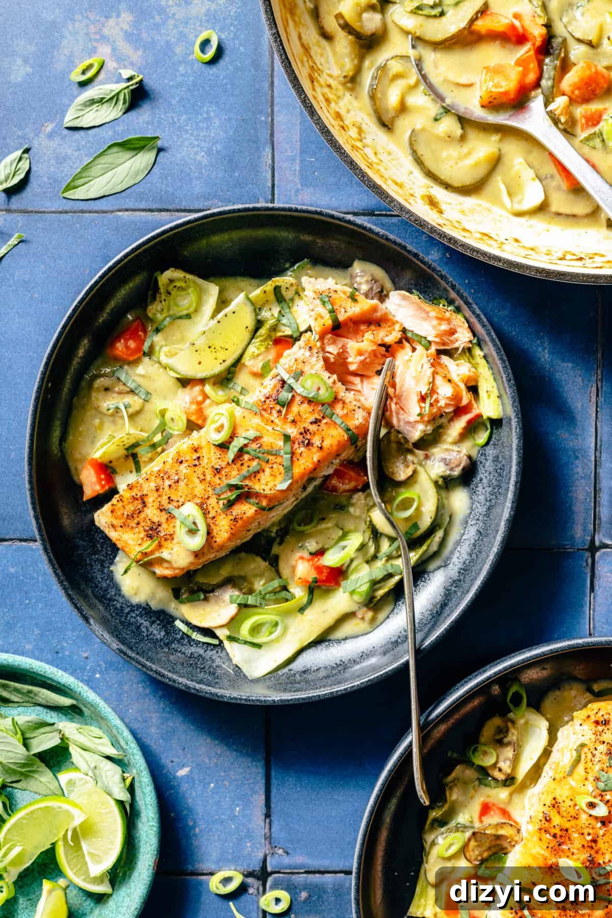 Thai Coconut Green Curry Salmon Recipe 3 Thai-Inspired Coconut Green Curry Salmon plated in blue bowl.