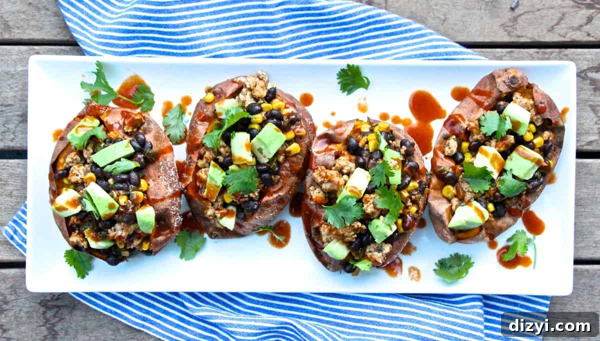 Enchilada Stuffed Sweet Potatoes with Melted Cheese 2 Enchilada Stuffed Sweet Potatoes