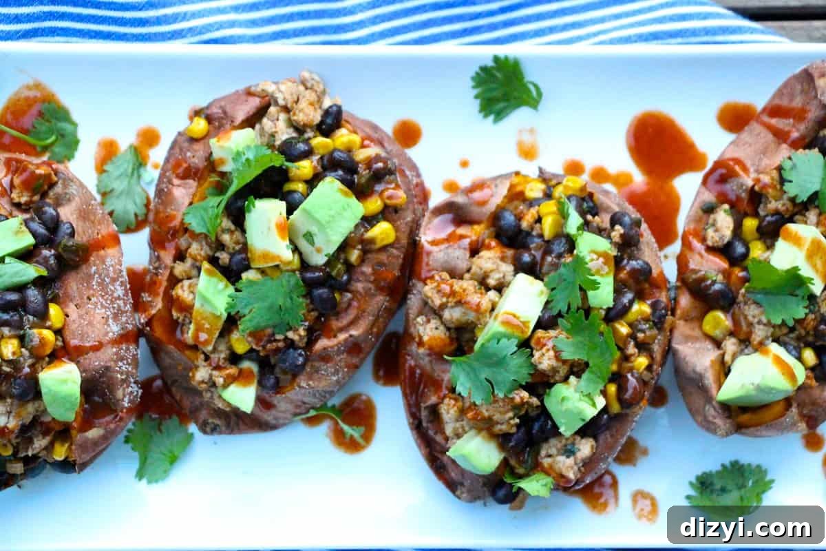 Enchilada Stuffed Sweet Potatoes with Melted Cheese 8 Enchilada Stuffed Sweet Potatoes