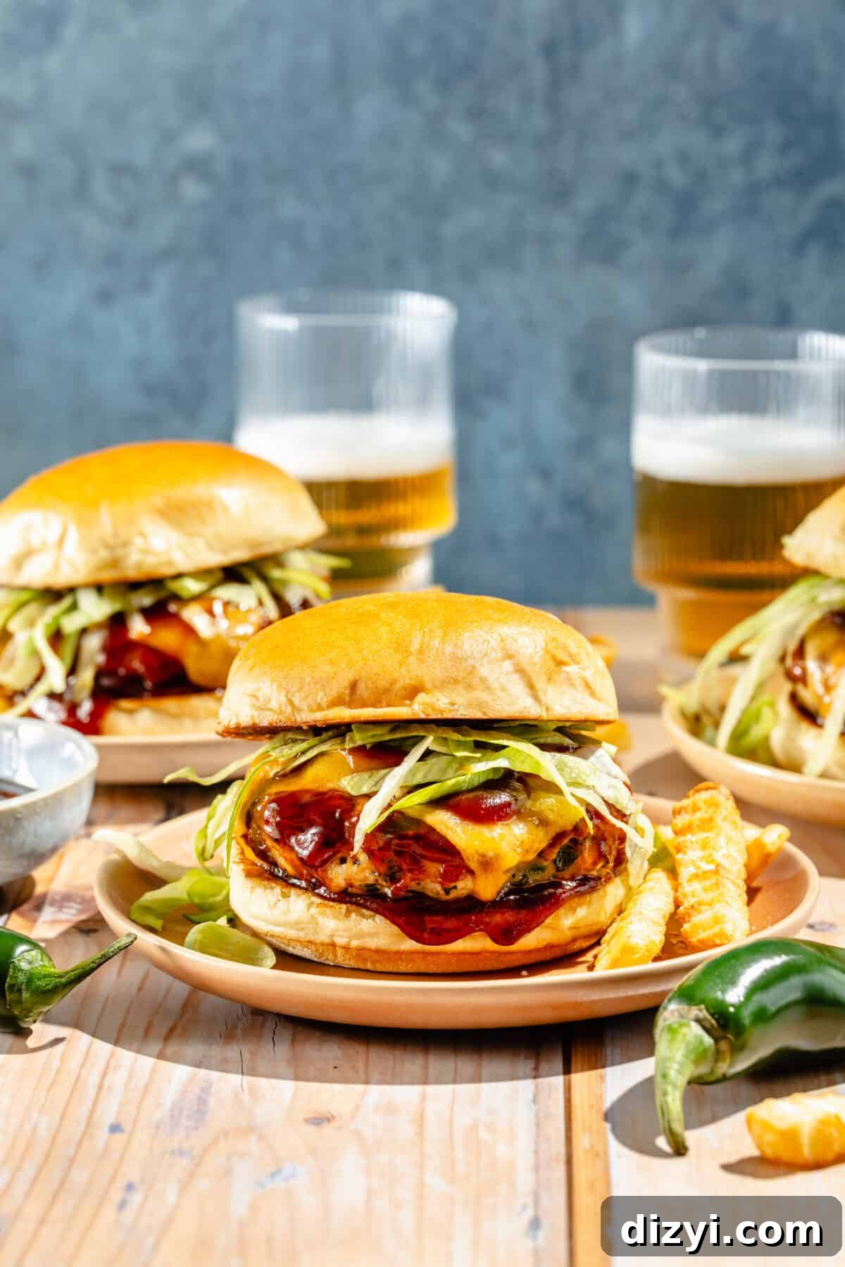 Grilled Jalapeno Cheddar Turkey Burgers Recipe 2 two jalapeno cheddar turkey burgers with beers in the background