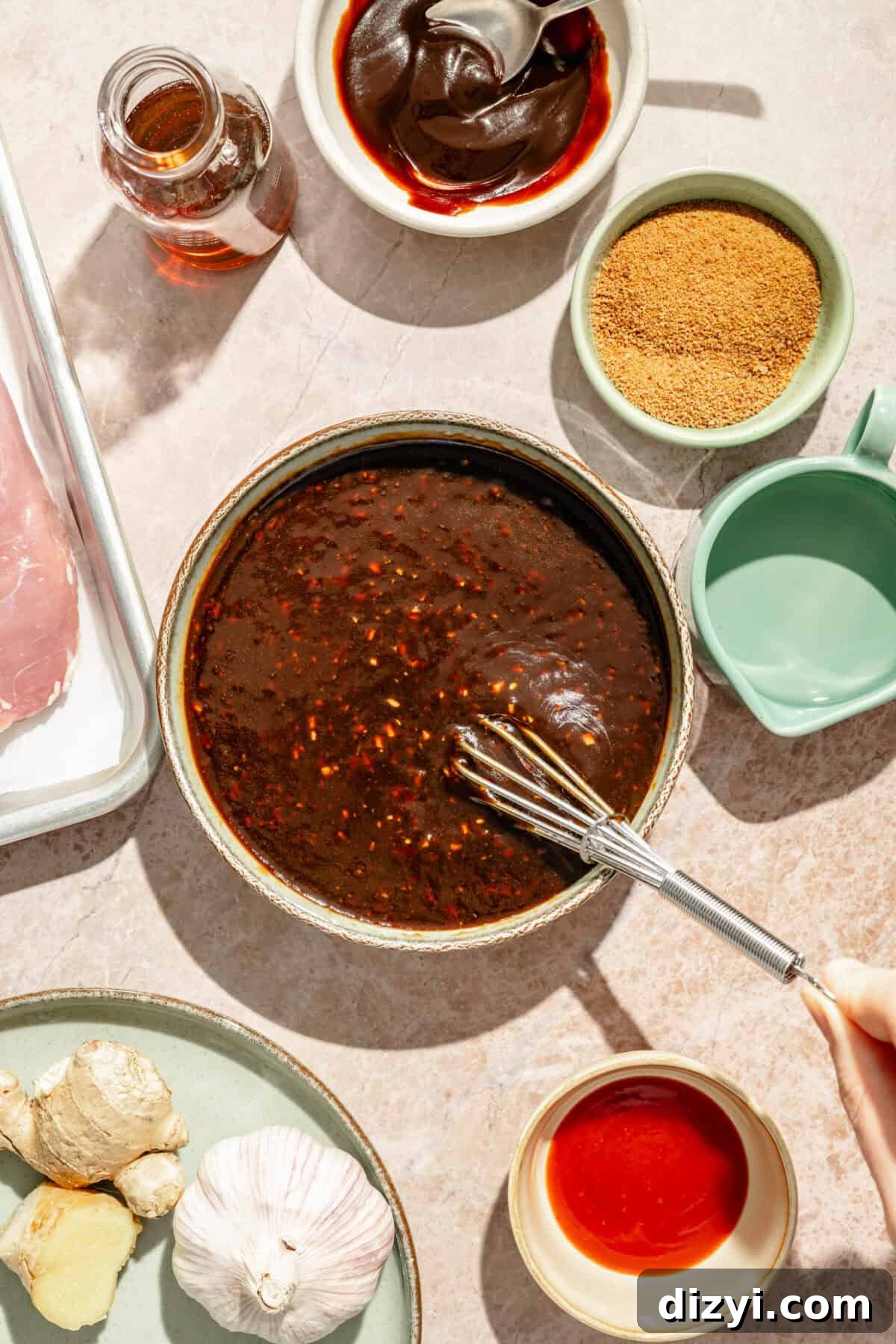 Grilled Pork Tenderloin Bowls with Hoisin Glaze 3 a bowl of marinade for pork tenderloin