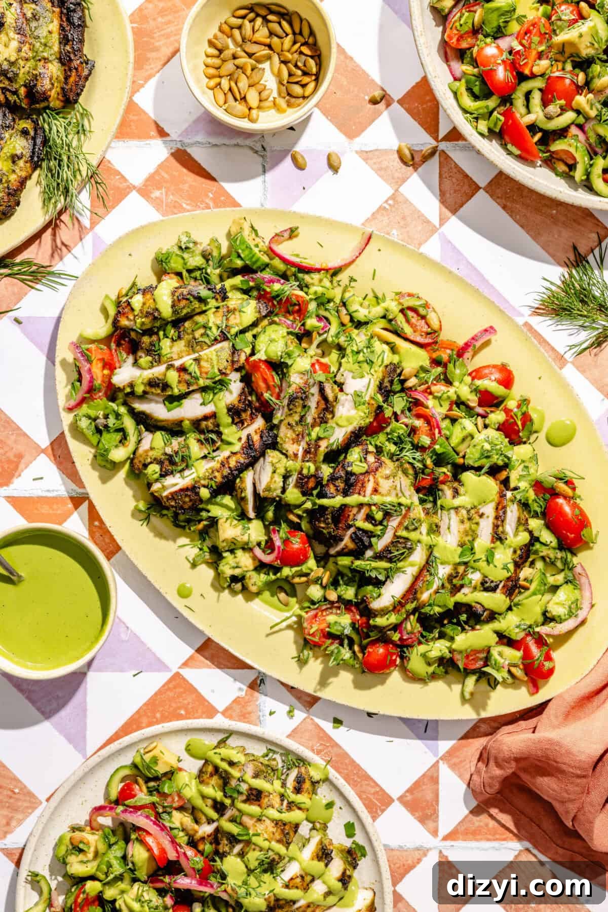 Grilled Chicken Thighs with Green Goddess Summer Salad 2 a platter with green goddess marinated grilled chicken thighs and salad