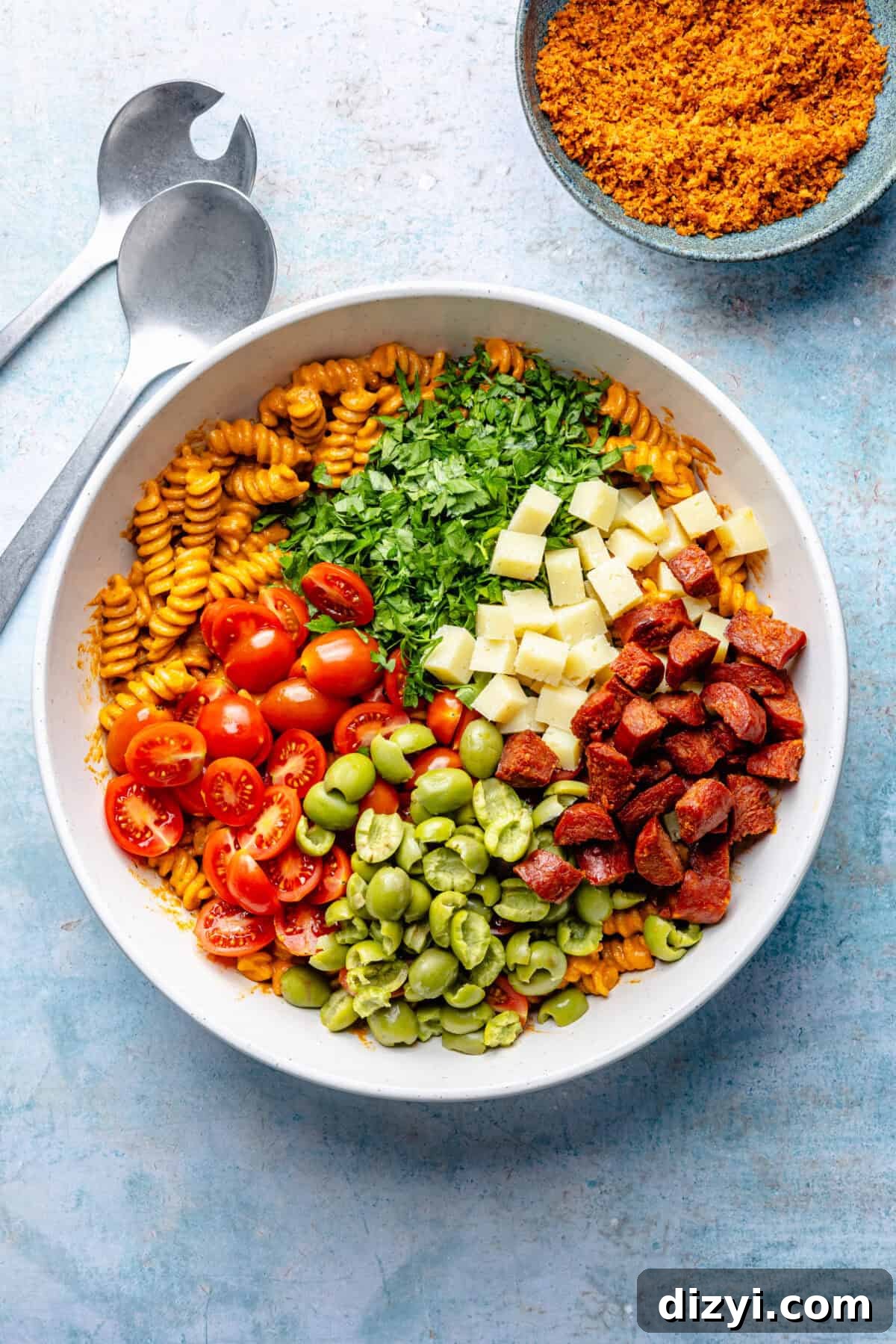 Smoky Romesco Pasta Salad with Roasted Red Peppers 5 Smoky Romesco Pasta Salad ingredients all in a bowl before being tossed.