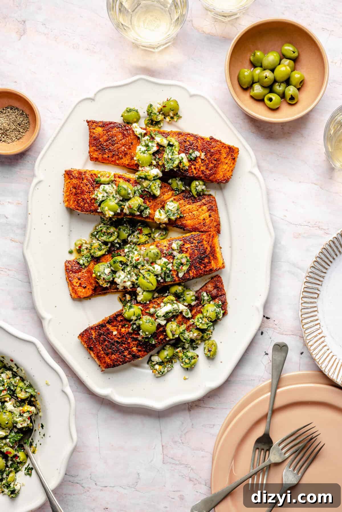 Pan-Seared Salmon with Castelvetrano Olive and Feta Salsa on platter.