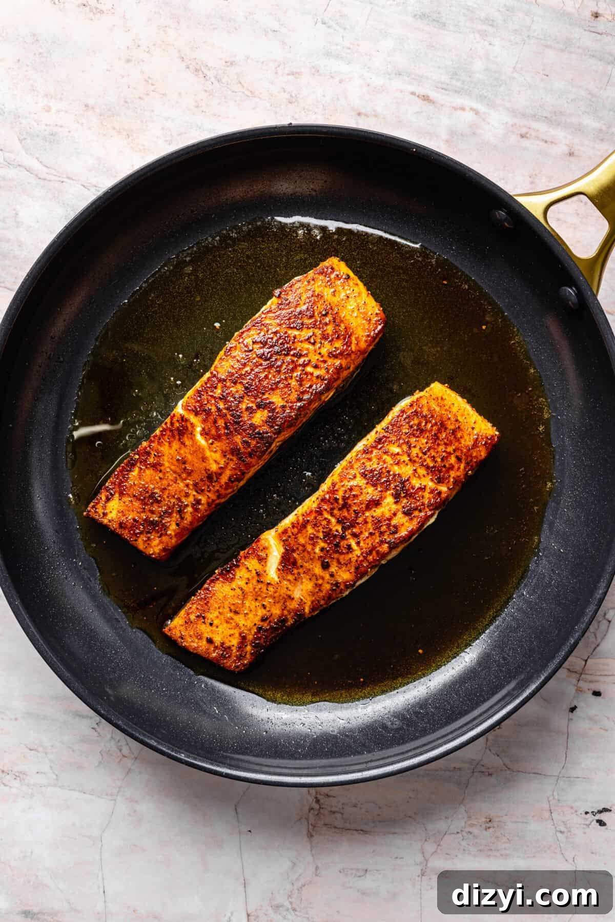Pan-Seared Salmon in cast iron skillet.