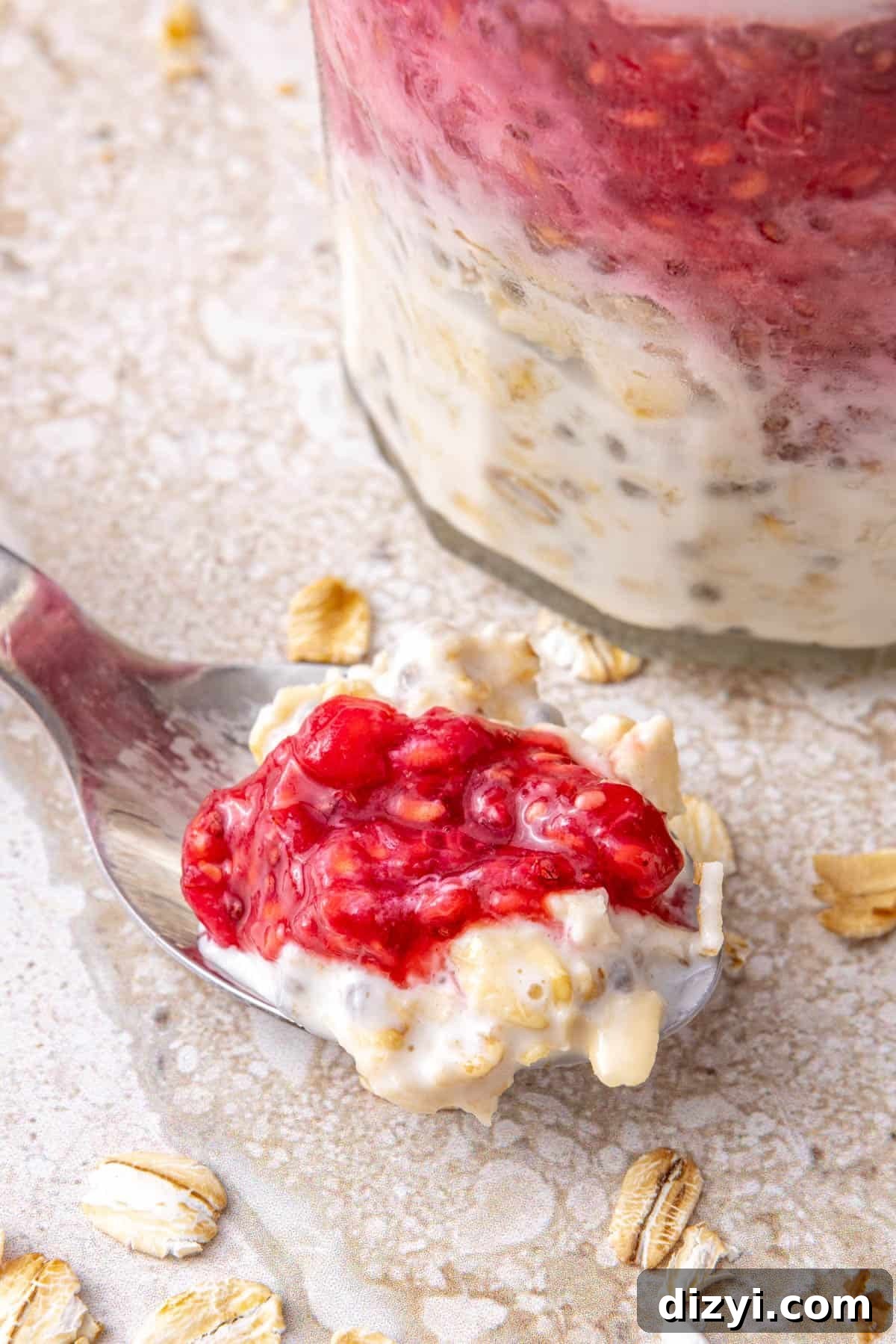 Overnight Oats Recipes: 3 Flavorful Breakfast Ideas 8 Close up of raspberry chia oats on spoon.