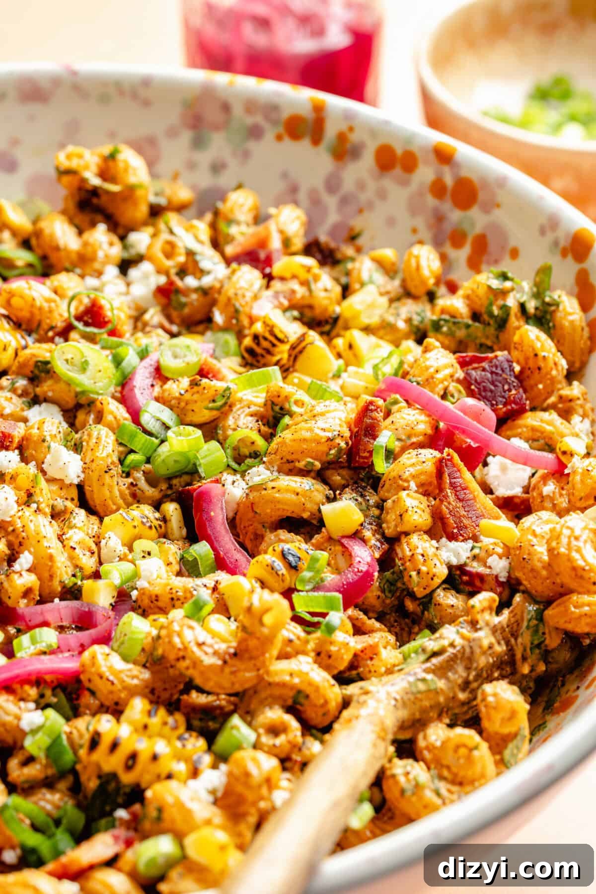 Smoky Chipotle Bacon Pasta Salad Recipe 6 Close up of Smokey Chipotle Bacon Pasta Salad in large serving bowl.