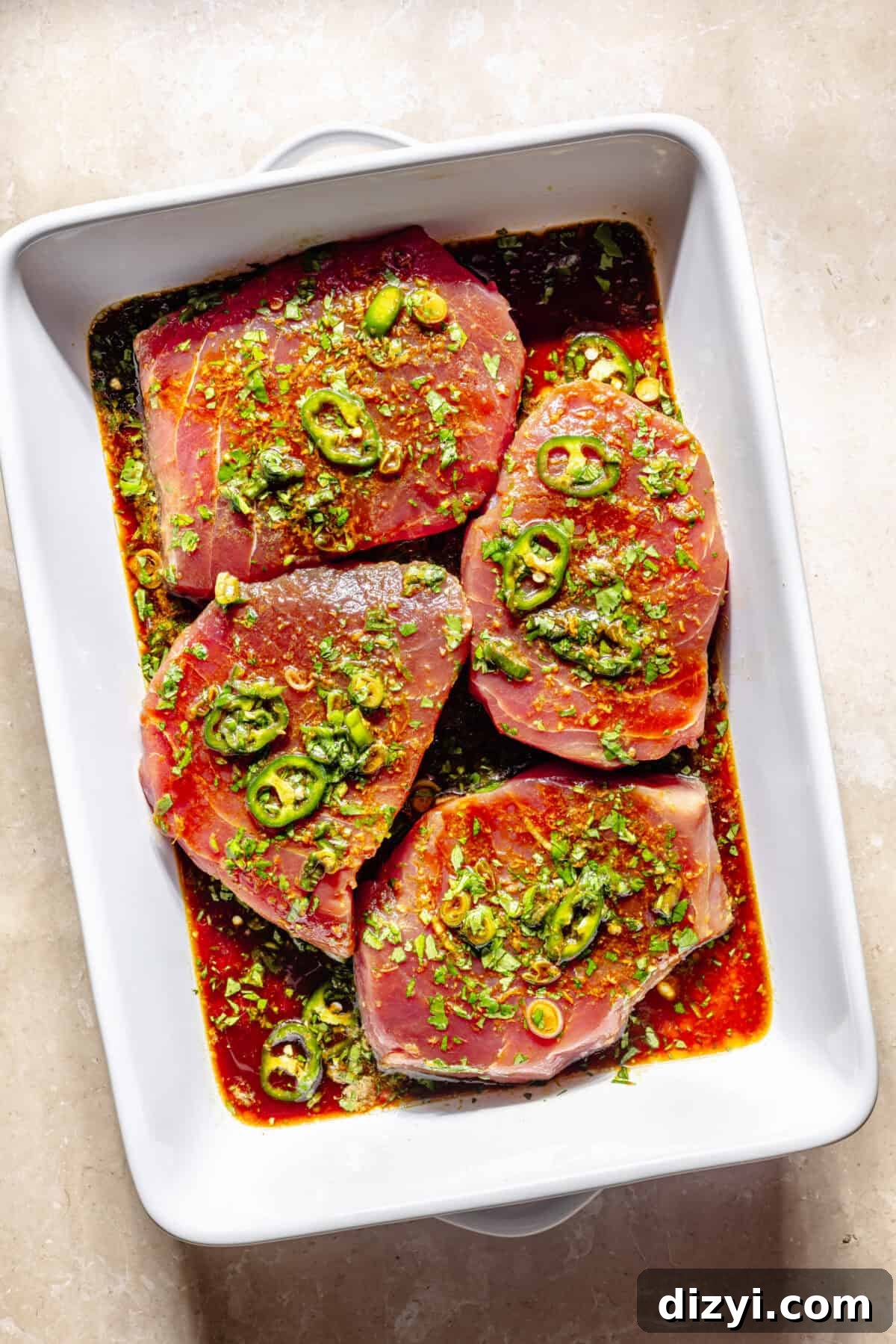 Grilled Ahi Tuna with Ponzu Lime Marinade Recipe 4 Tuna marinating in baking dish.