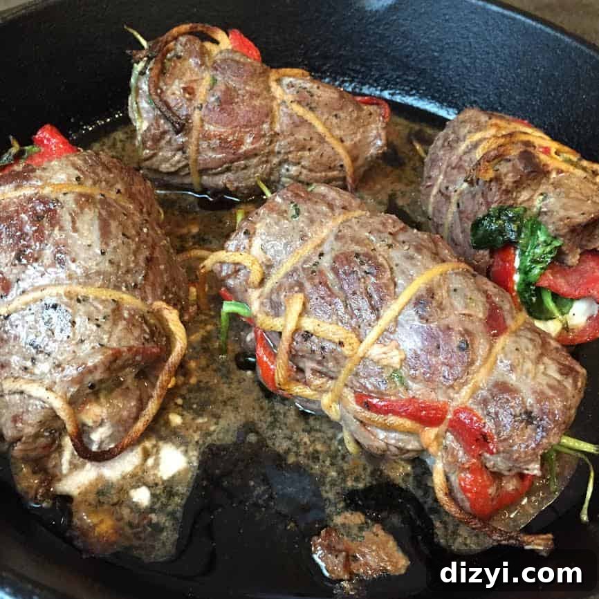 Roasted Red Pepper and Goat Cheese Skirt Steak Roll Ups