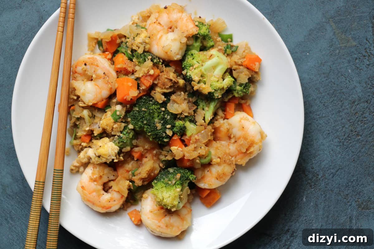 Cauliflower Fried Rice with Shrimp served in a bowl