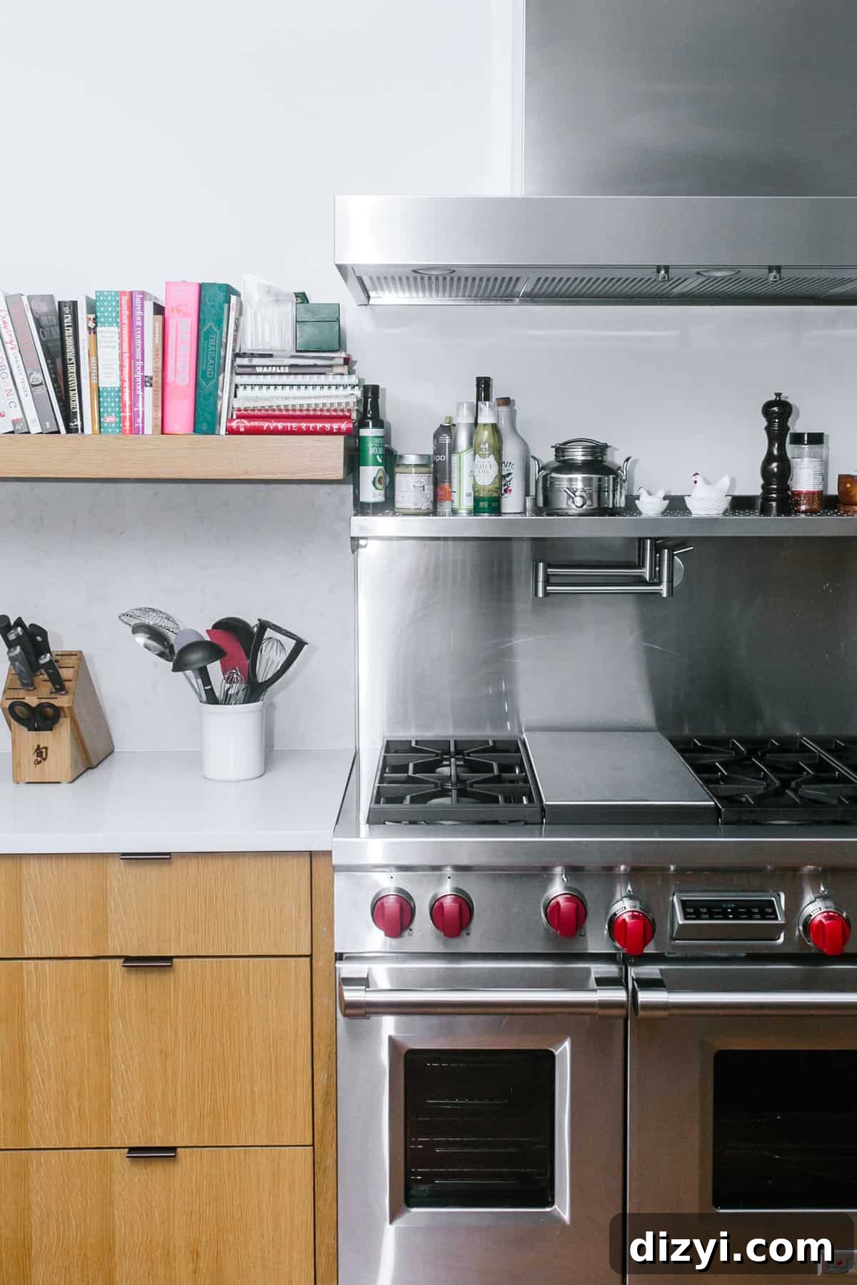 Shelves with cookbooks and kitchen accessories