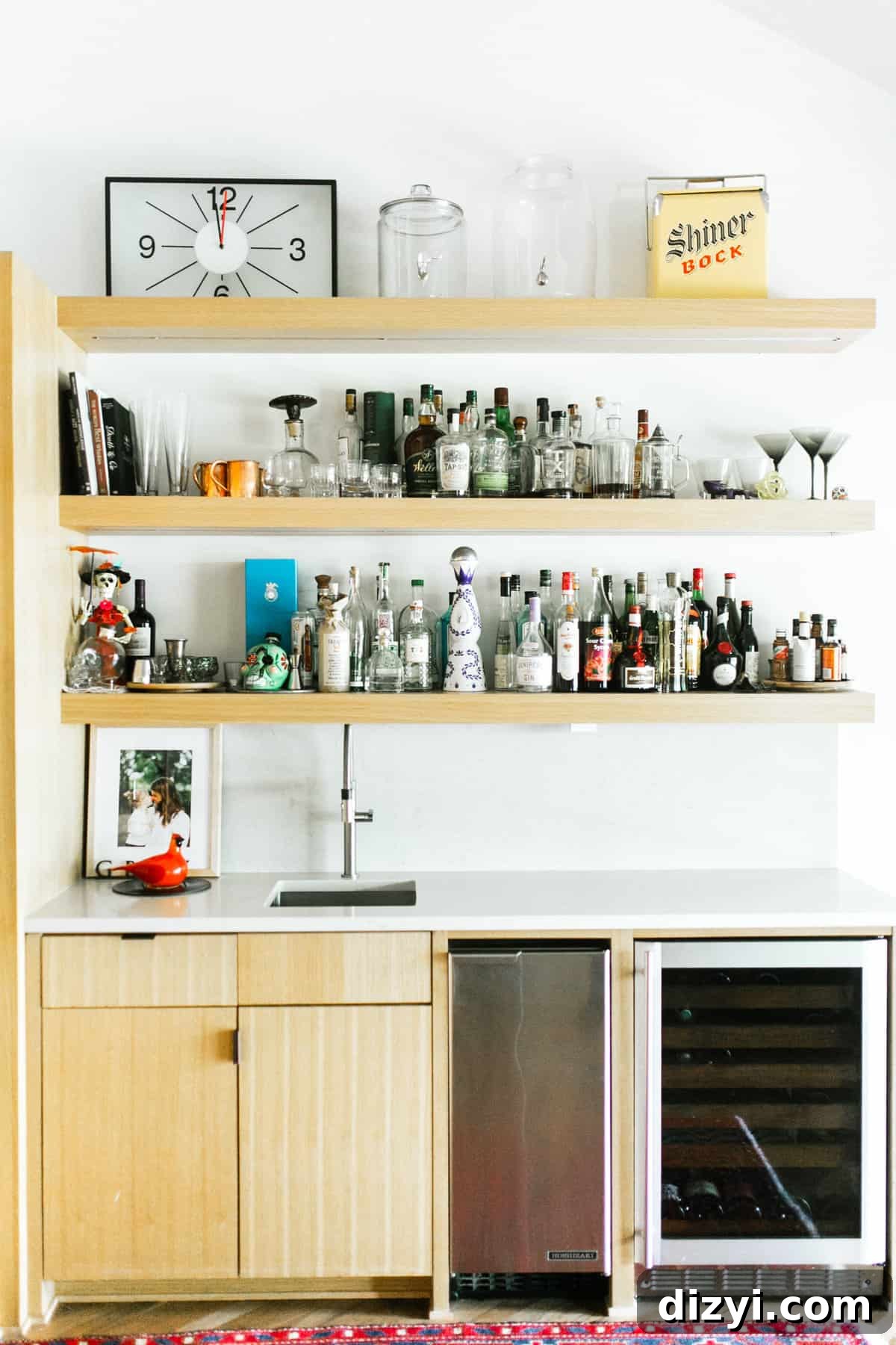 Kitchen bar area with open shelves and glassware