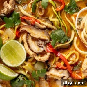 Thai Red Curry Chicken Soup with Zucchini Noodles 8 Thai-Inspired Red Curry Chicken Zoodle Soup in a white bowl.
