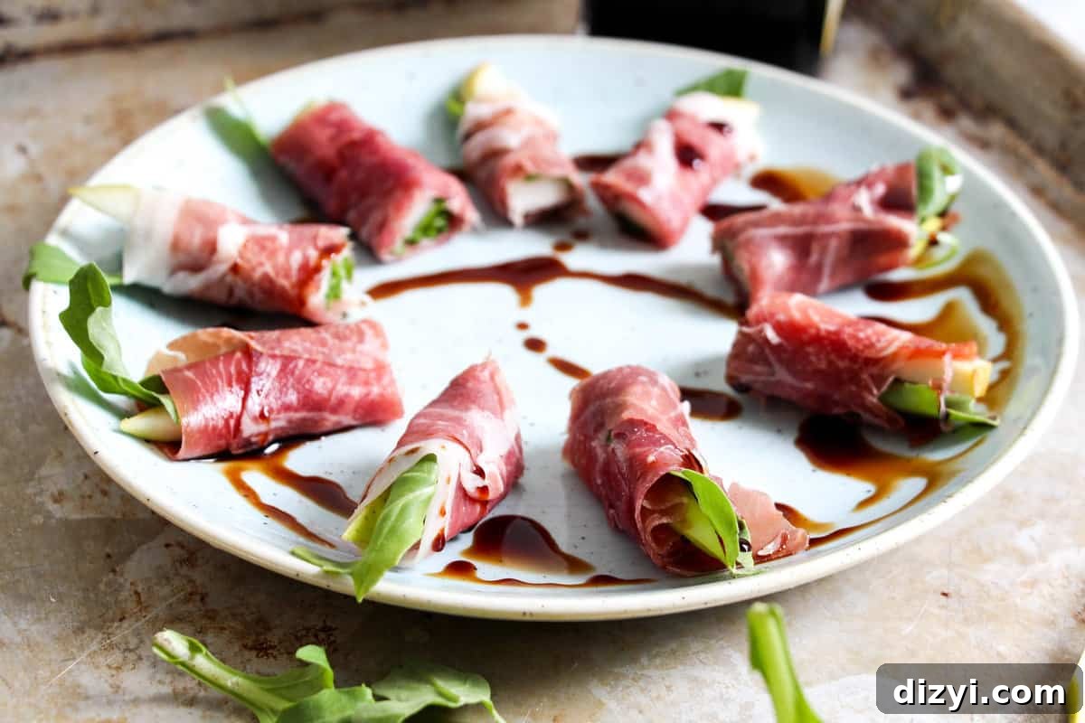Platter of prosciutto pear arugula rolls