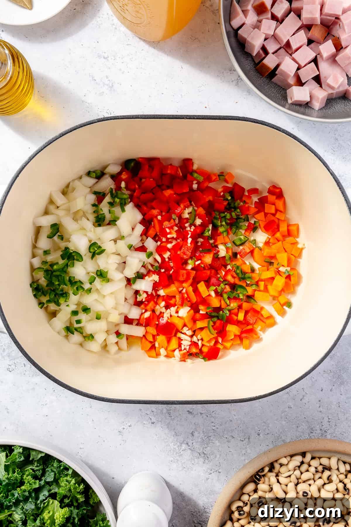 Cut veggies in dutch oven.