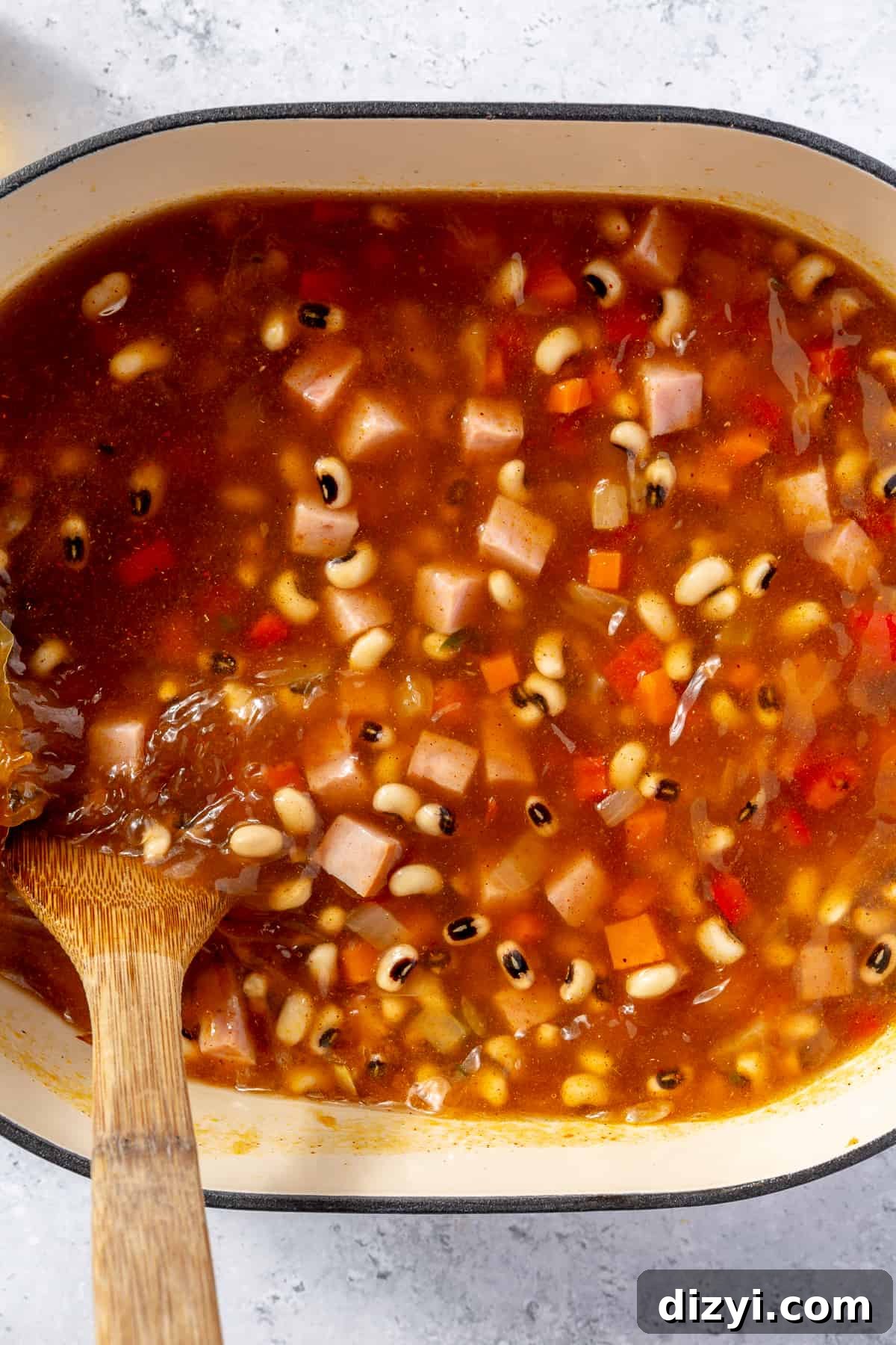Black-eyed peas cooking in dutch oven.