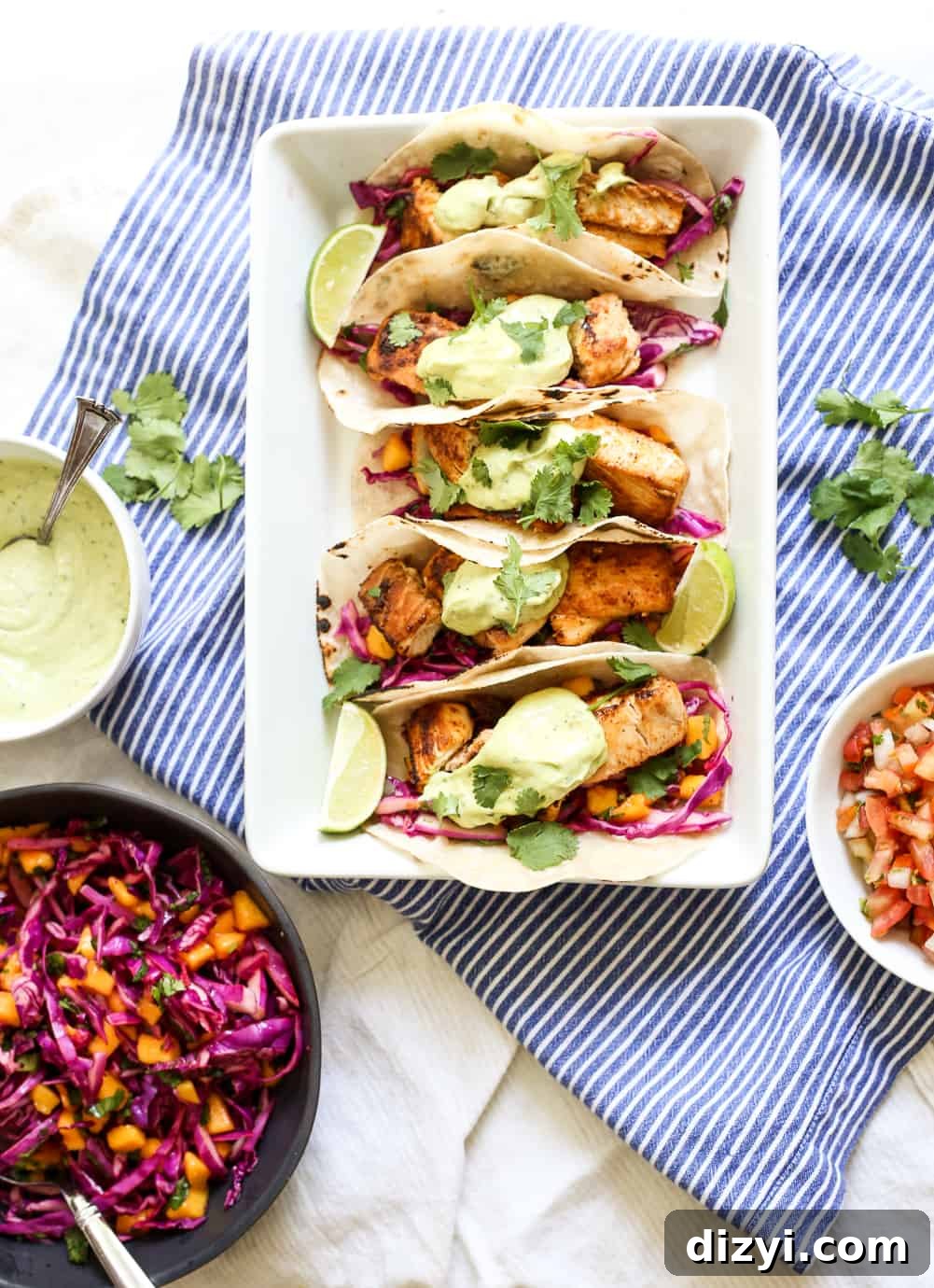 Crispy Baja Fish Tacos with Mango Coleslaw and Avocado Crema 2 Baja Fish Tacos with Mango Coleslaw and Avocado Crema