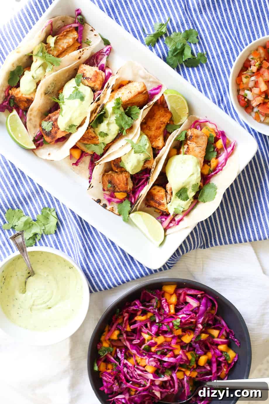 Crispy Baja Fish Tacos with Mango Coleslaw and Avocado Crema 4 Baja Fish Tacos with Mango Coleslaw and Avocado Crema