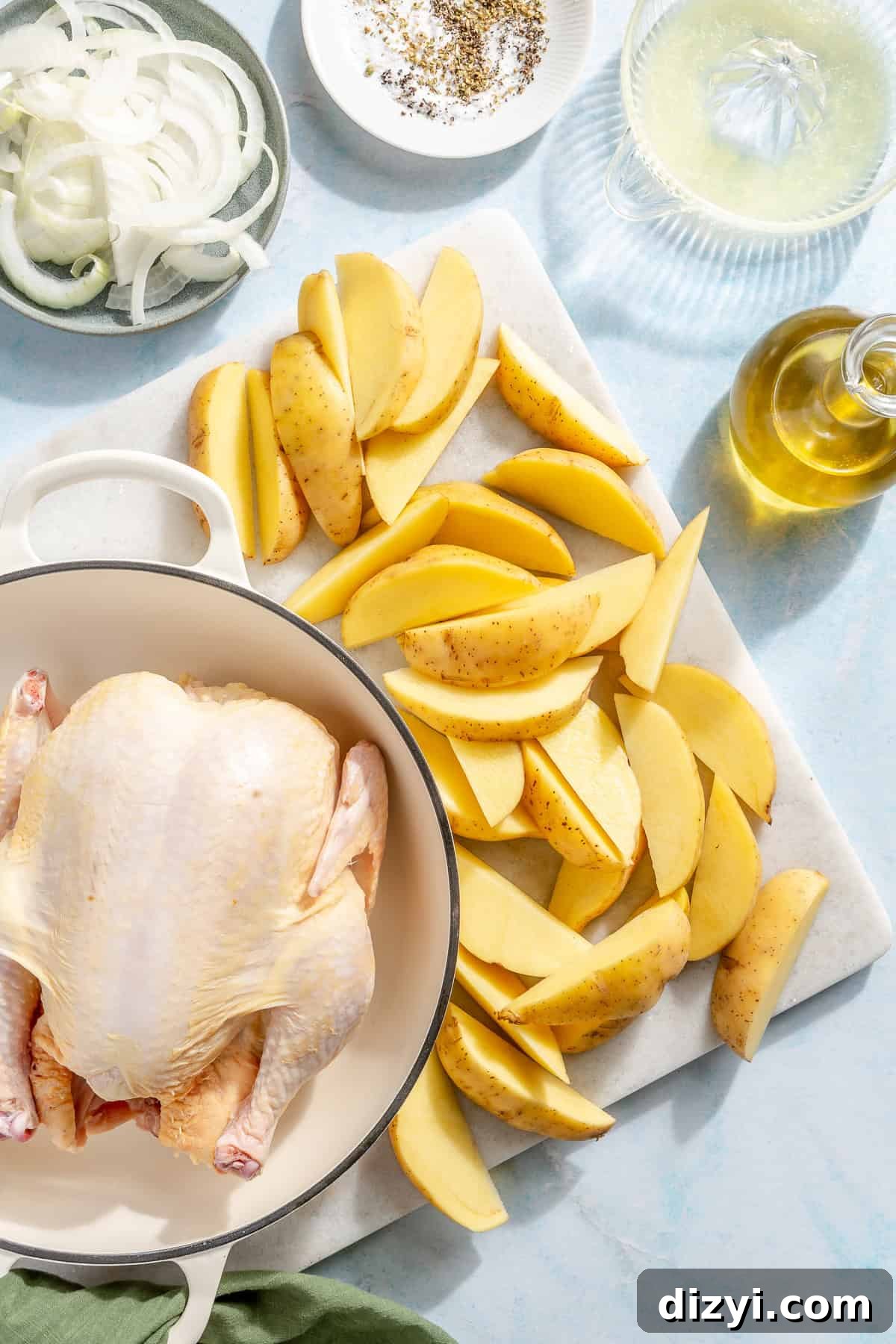 Whole Greek Roast Chicken with Lemon Potatoes 4 Whole Roasted Greek Chicken and Potatoes ingredients on counter.