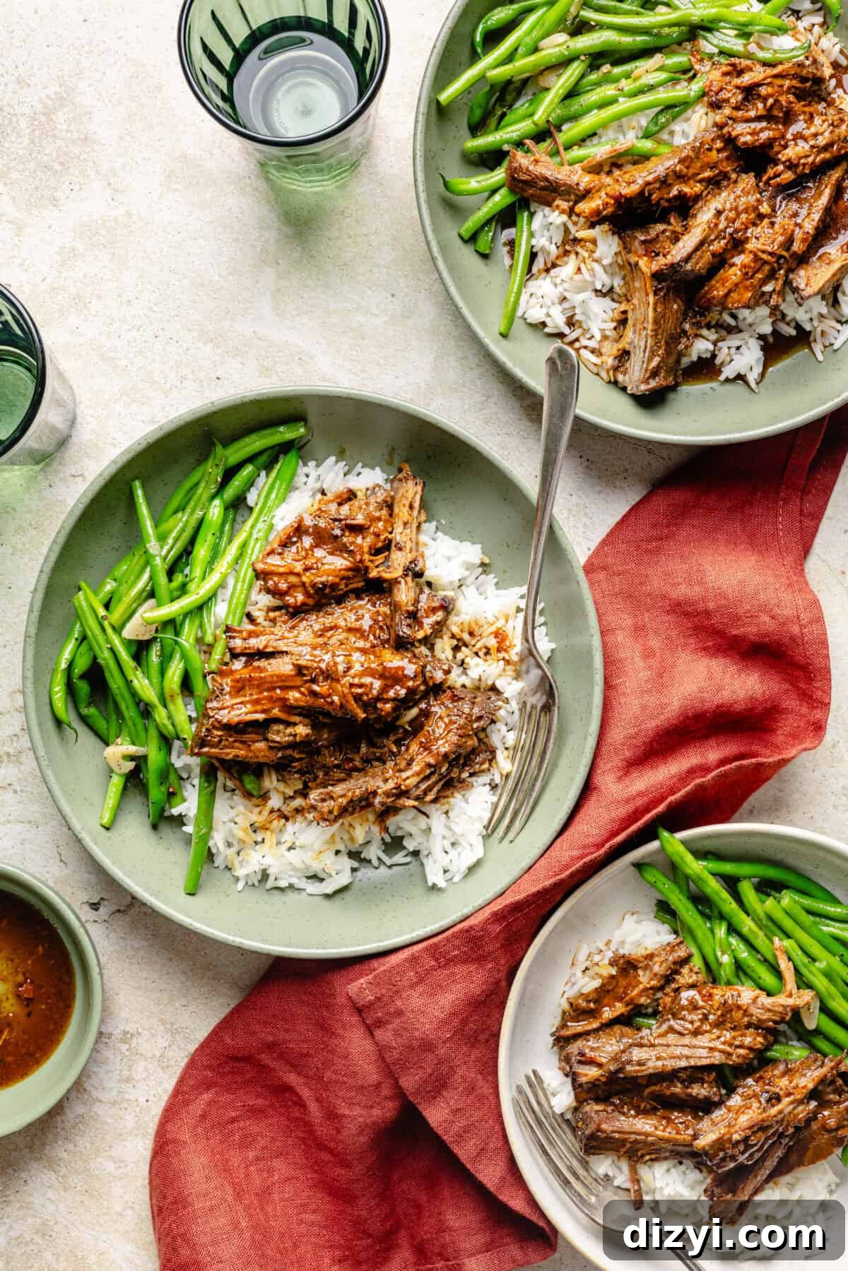 Slow Cooker Miso Ginger Chuck Roast Recipe 2 Slow Cooker Miso-Ginger Chuck Roast in a bowl over rice with green beans.