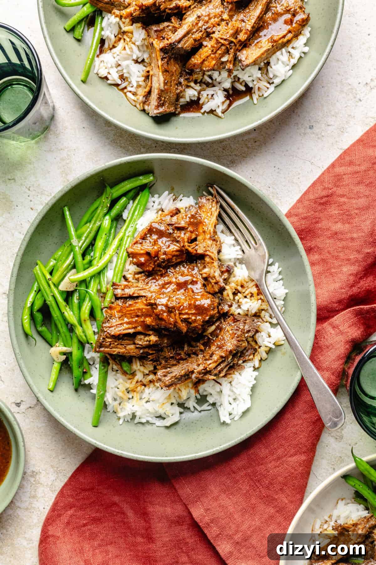 Slow Cooker Miso Ginger Chuck Roast Recipe 4 Slow Cooker Miso-Ginger Chuck Roast in a bowl over rice with green beans.