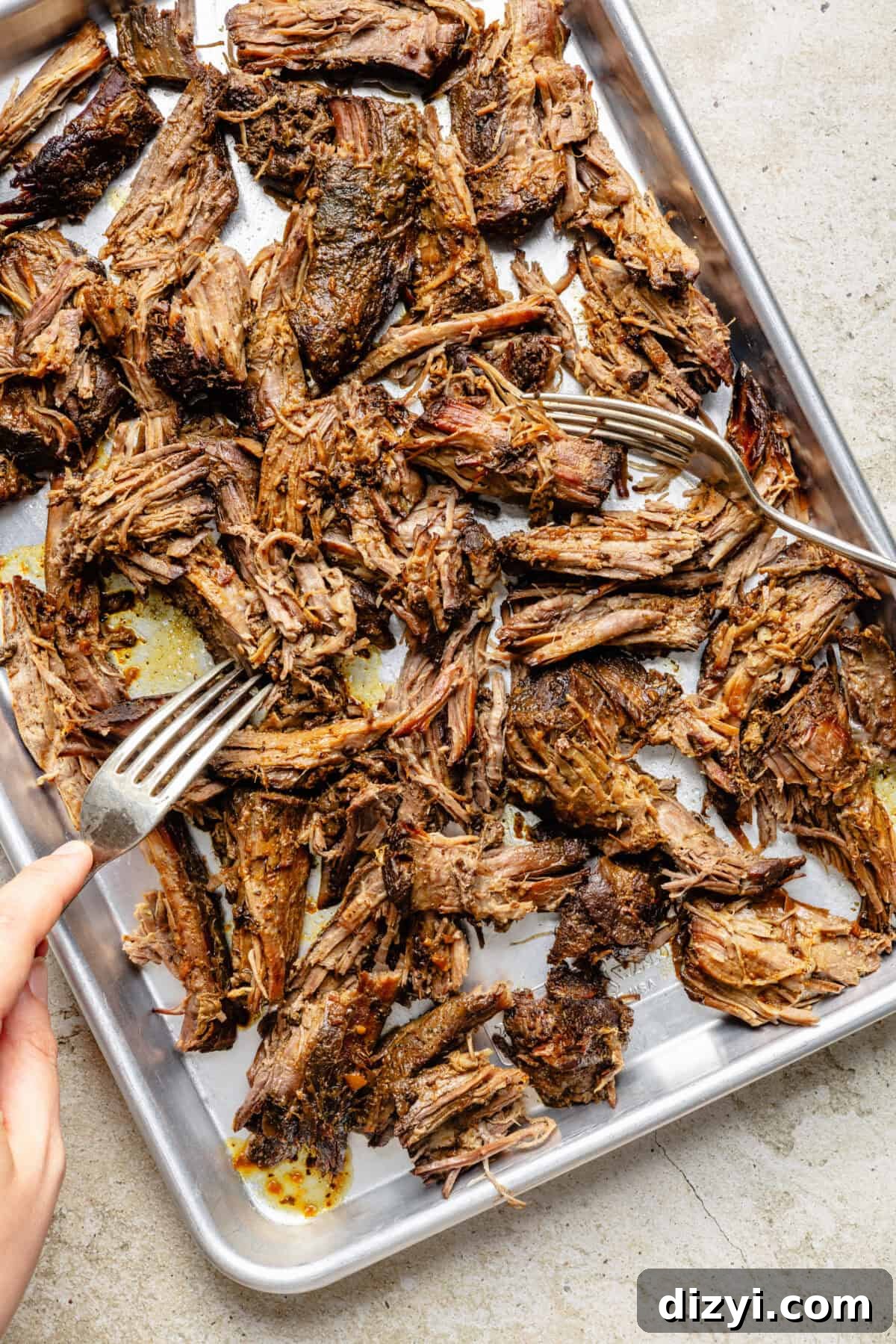 Slow Cooker Miso Ginger Chuck Roast Recipe 6 Slow Cooker Miso-Ginger Chuck Roast shredded on sheet pan.