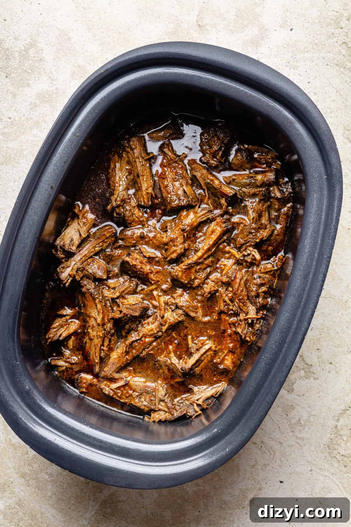 Slow Cooker Miso Ginger Chuck Roast Recipe 7 Slow Cooker Miso-Ginger Chuck Roast shredded and cooked in slow cooker.